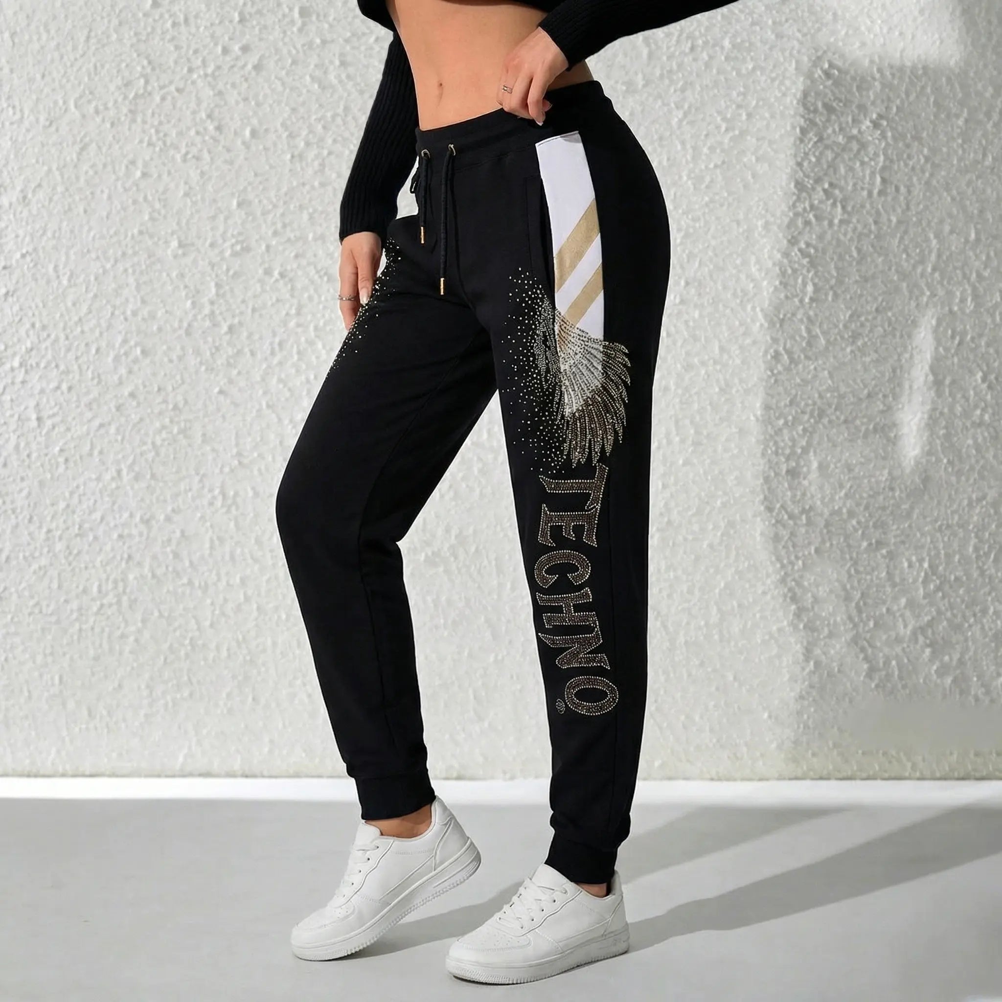 TCH Rhinestone Wing Techno Jogger Pants: When camouflage meets wings, every step shines