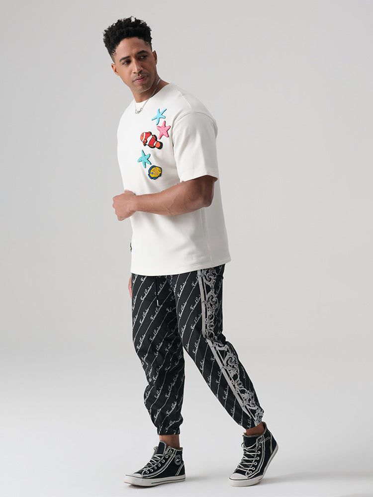 TCH All Over Rhinestone Graphic Nylon Jogger