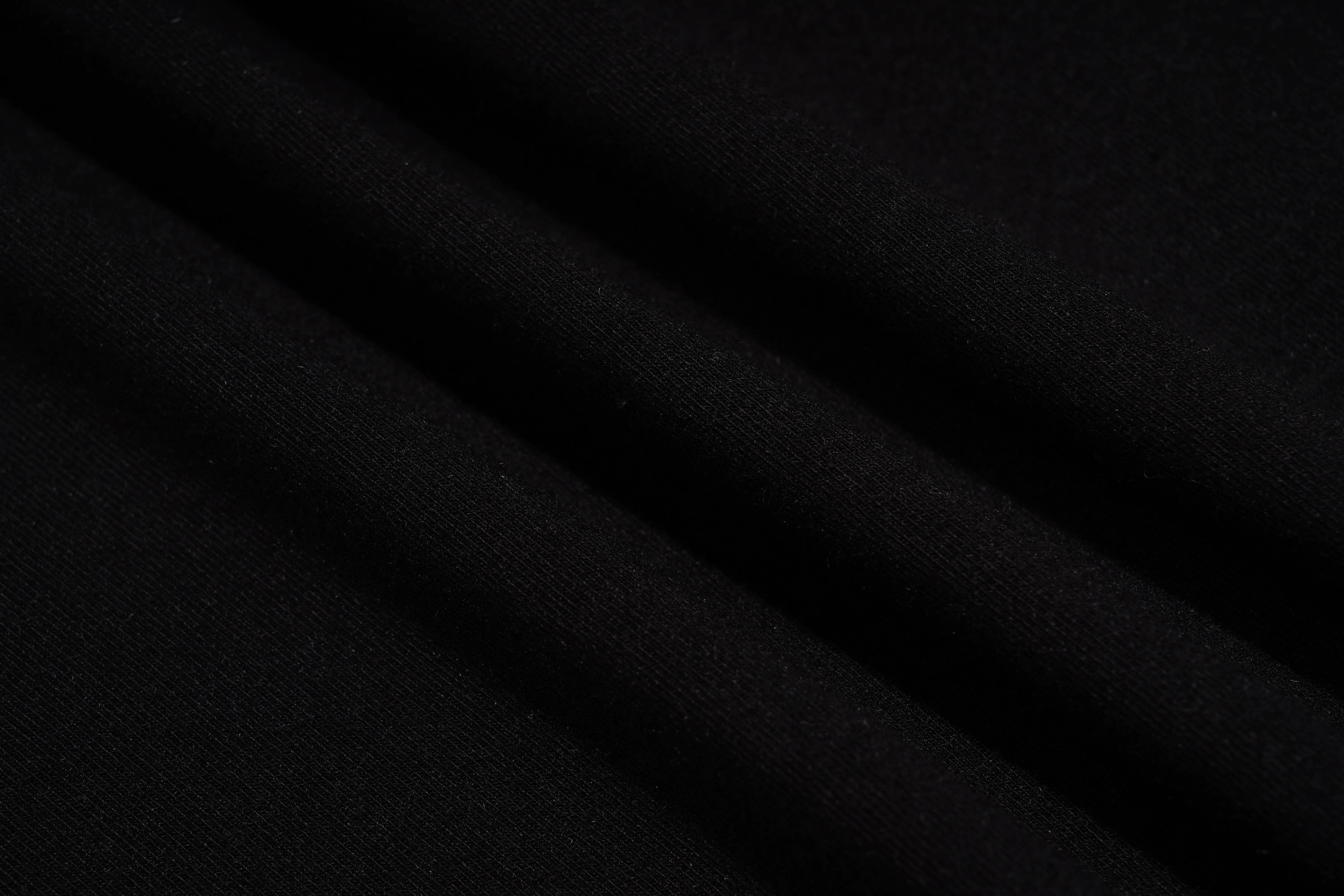 Close-up of black fabric texture, TCH Angel Wings Rhinestone Oversized T-Shirt