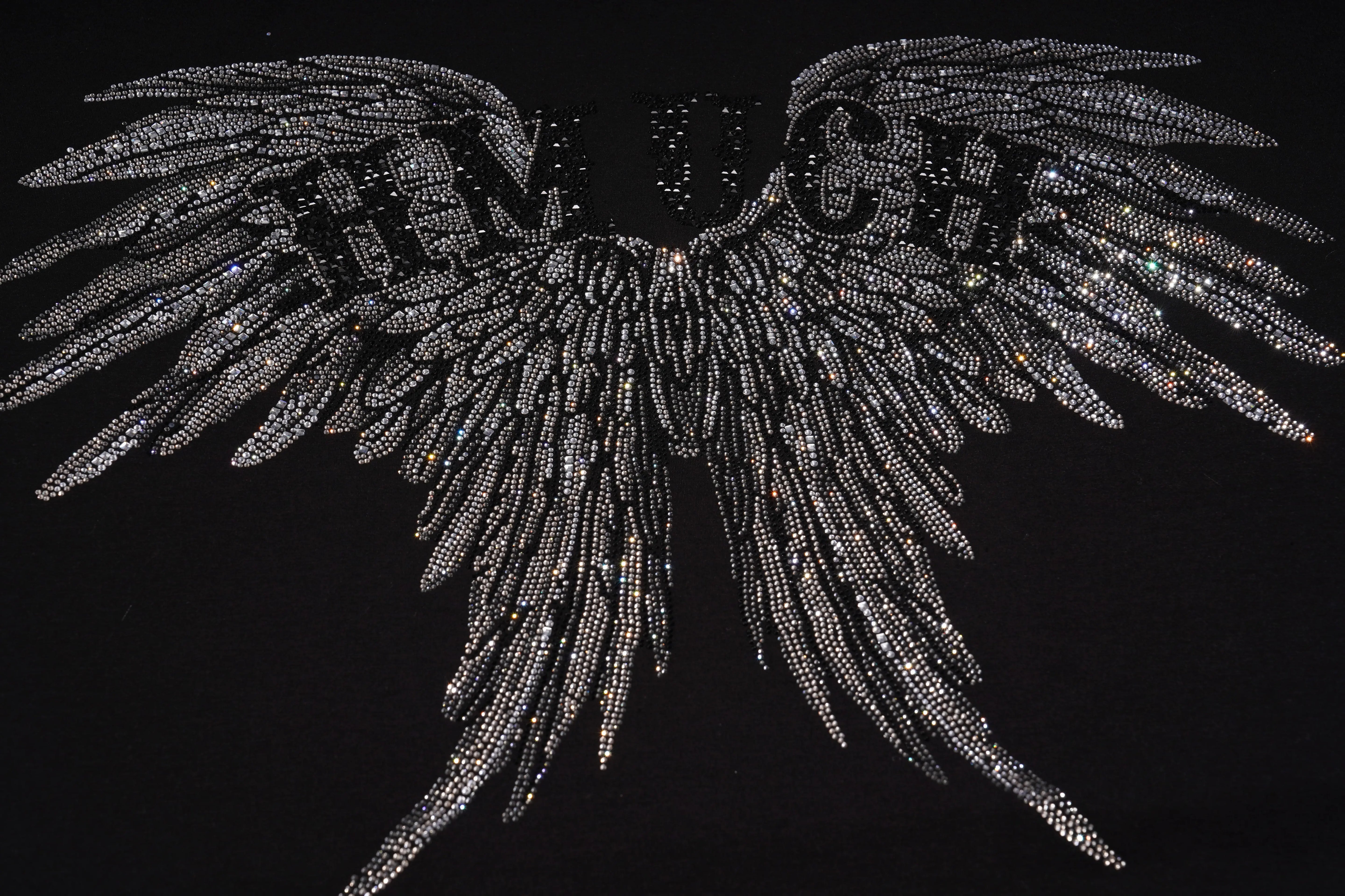 Decorative angel wings with rhinestones on a black background, TCH Angel Wings Rhinestone Oversized T-Shirt