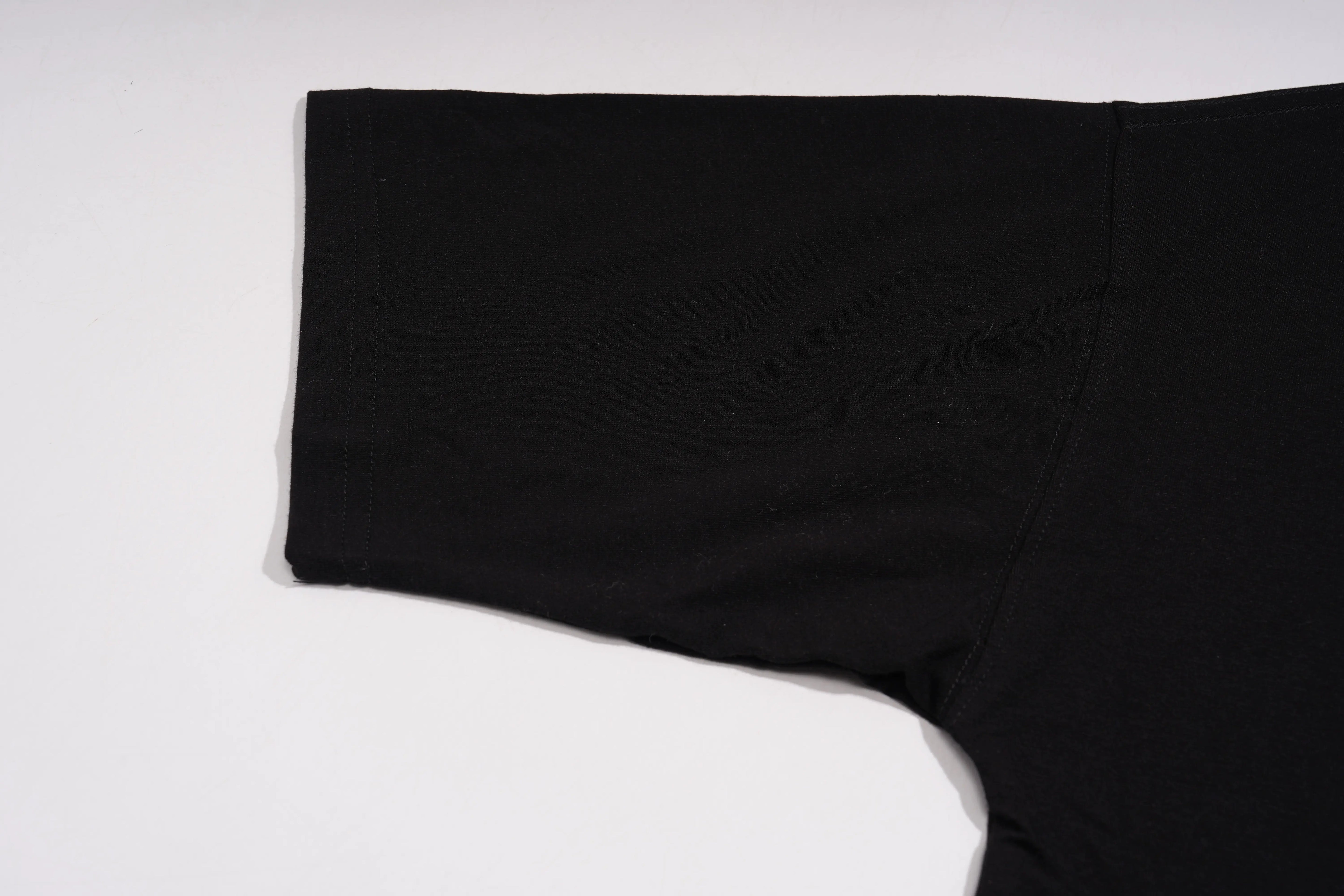 Black fabric on a white background, TCH Angel Wings Rhinestone Oversized T-Shirt
