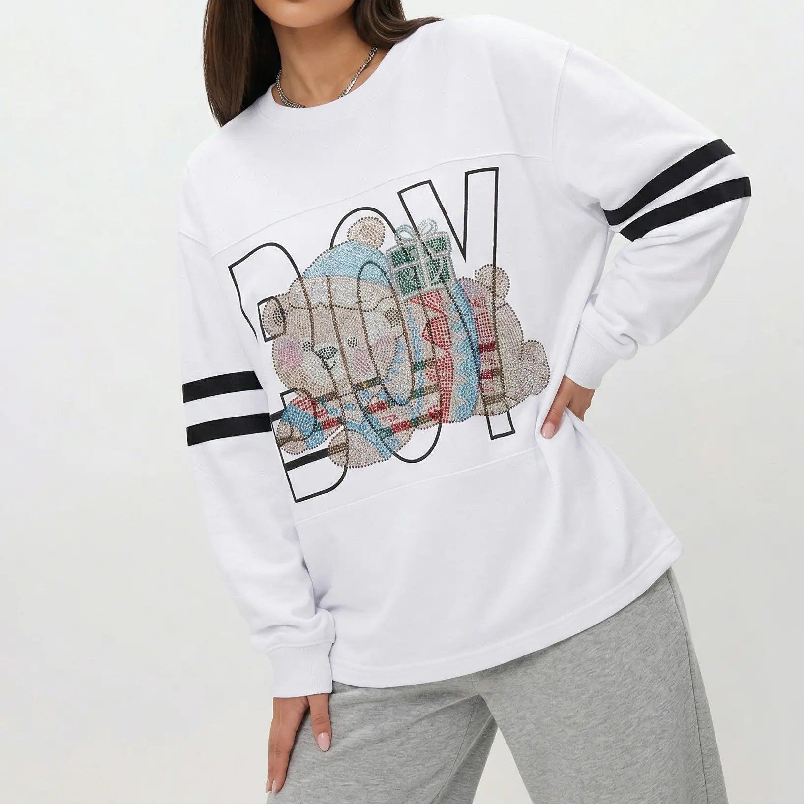 White sweatshirt with colorful 'BOY' design and gray pants on a white background TCH BOY Rhinestone Bear Sweatshirt-