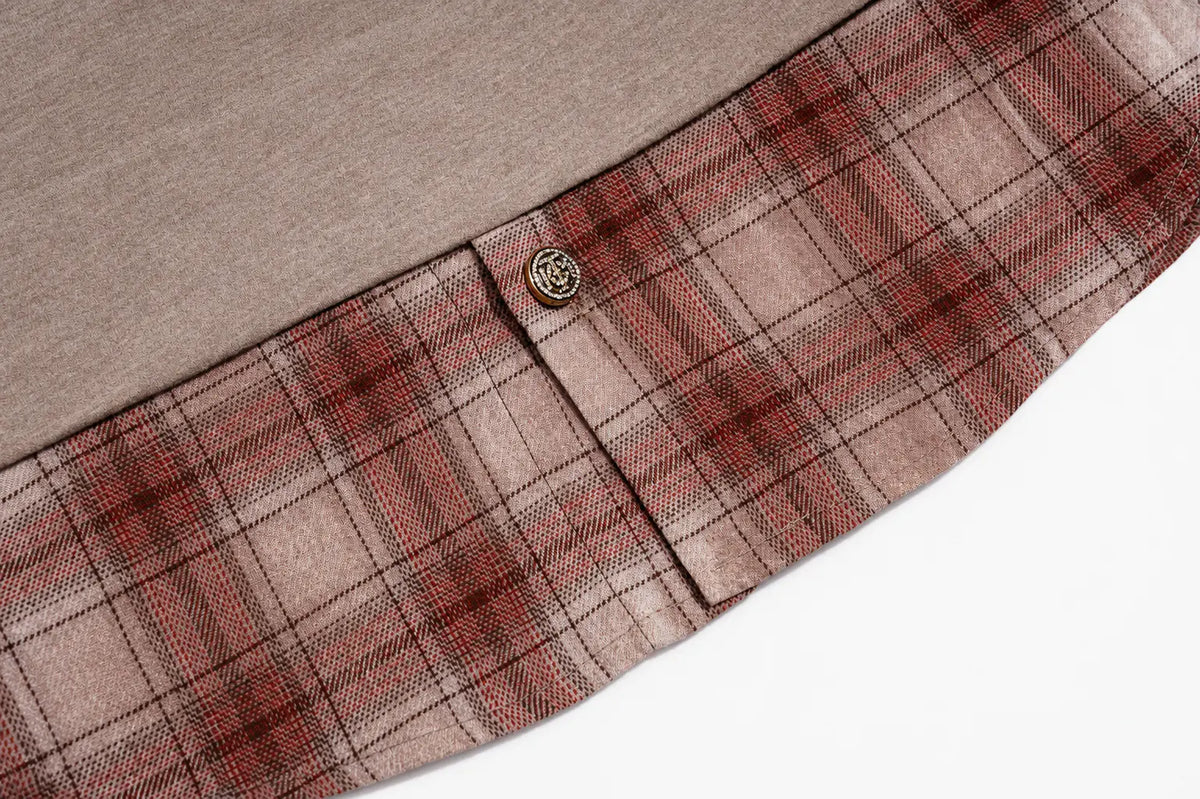 Close-up of a plaid shirt hem in a dusty red and brown tartan pattern, finished with a single round metal button, shown against a white background. TCH Beige Teddy Bear Rhinestone Layered Hoodie Sweatshirt