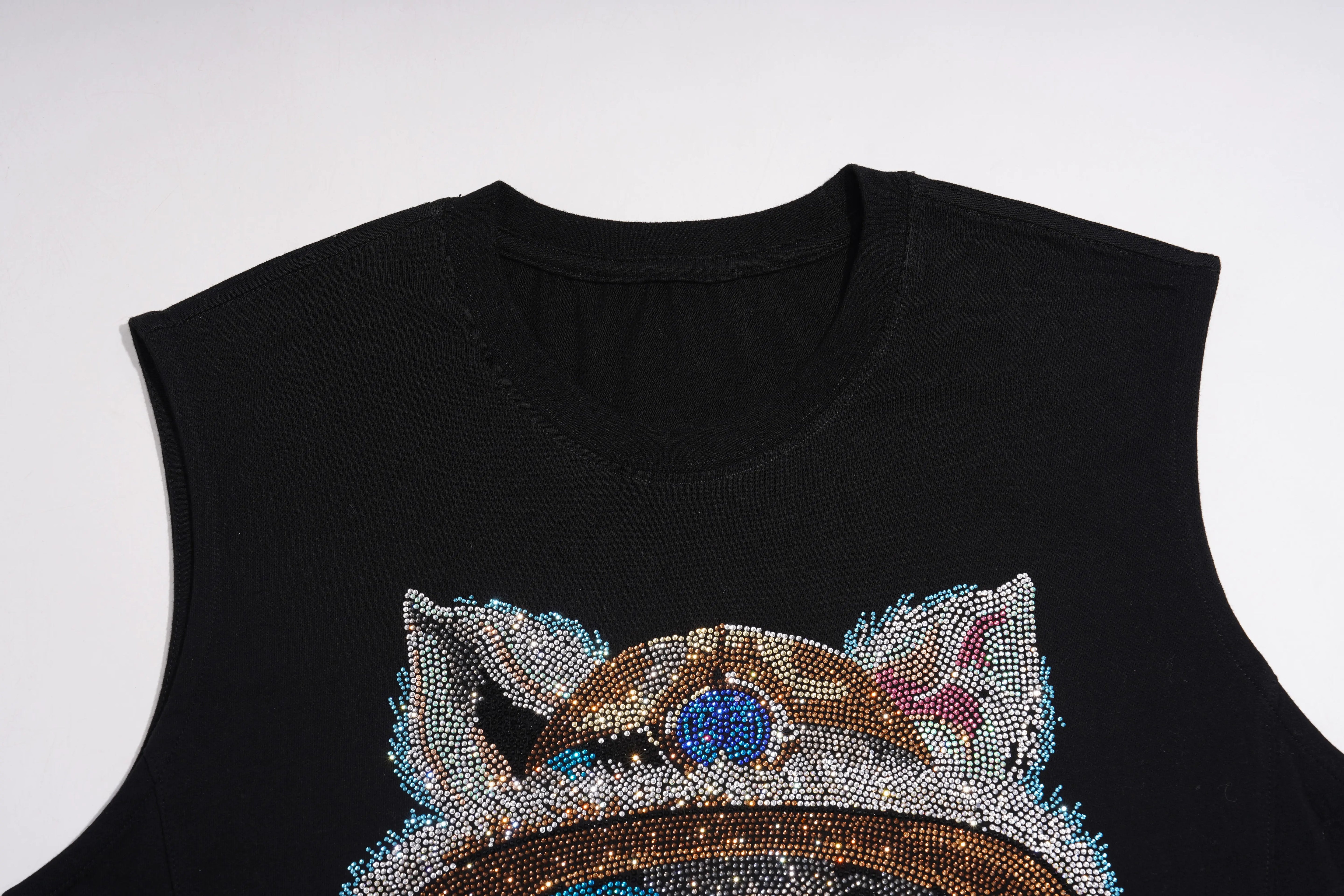 Black sleeveless top with decorative cat face design on a white background, TCH Black Rhinestone Cartoon Pig Sleeveless Top