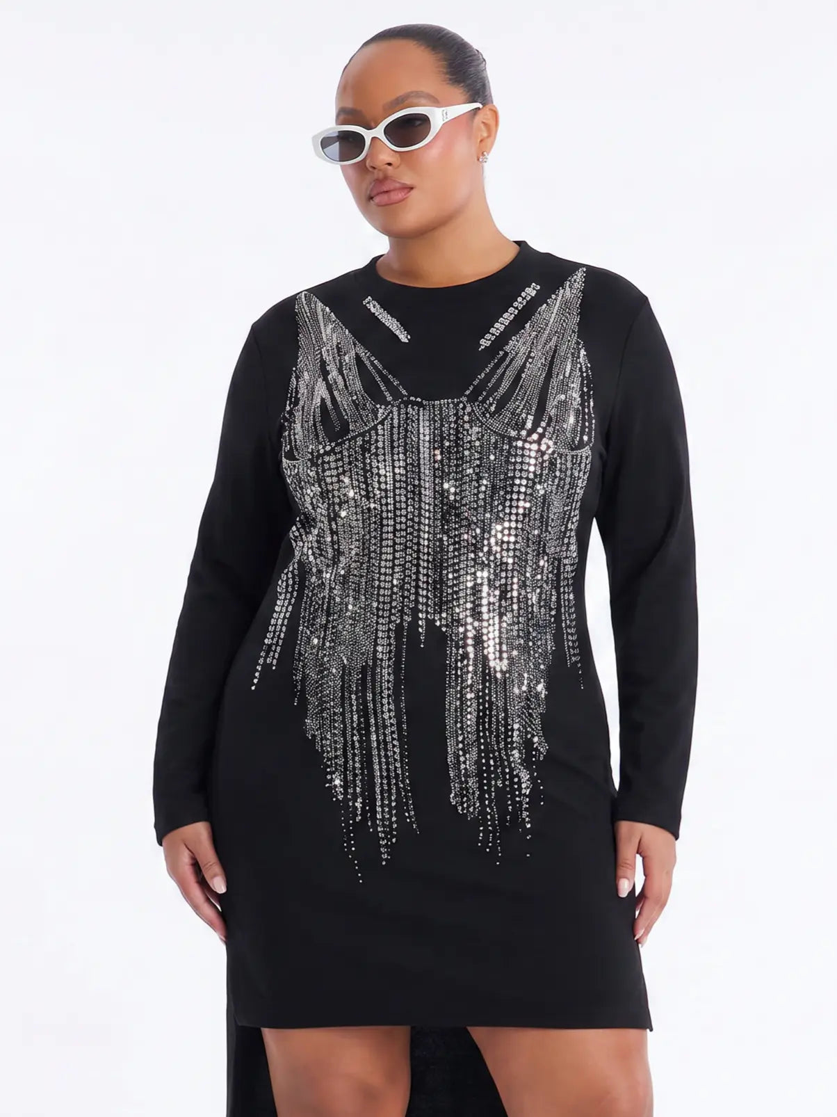 A model wearing a black long-sleeve mini dress with a large silver rhinestone fringe embellishment on the front, styled with white-framed sunglasses against a plain white background. TCH Black Rhinestone Fringe Detail Long Sleeve Mini Dress