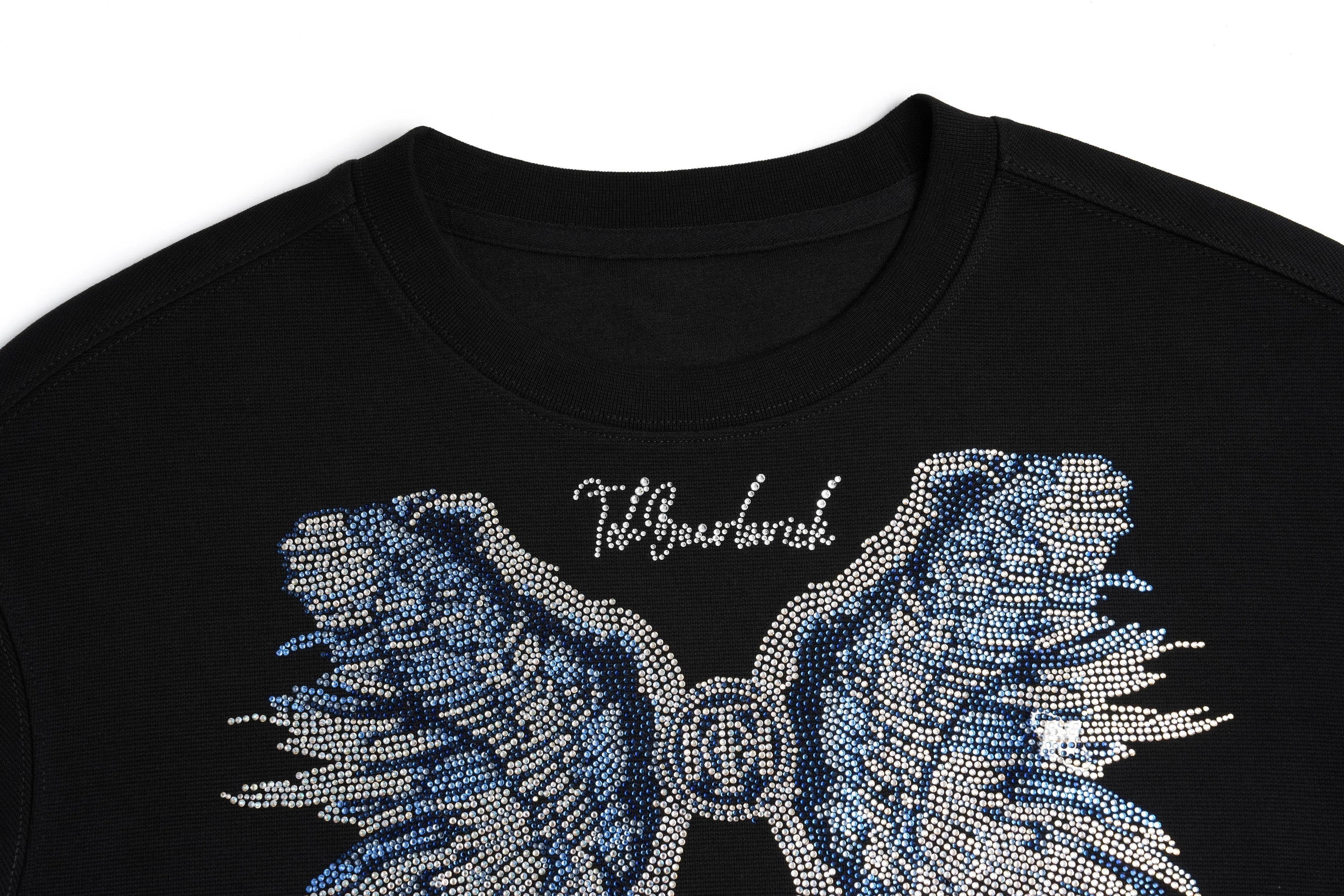 Black shirt with a decorative blue bow and 'Talbot's' branding on a white background, TCH Blue Angel Wings Rhinestone Sweatshirt