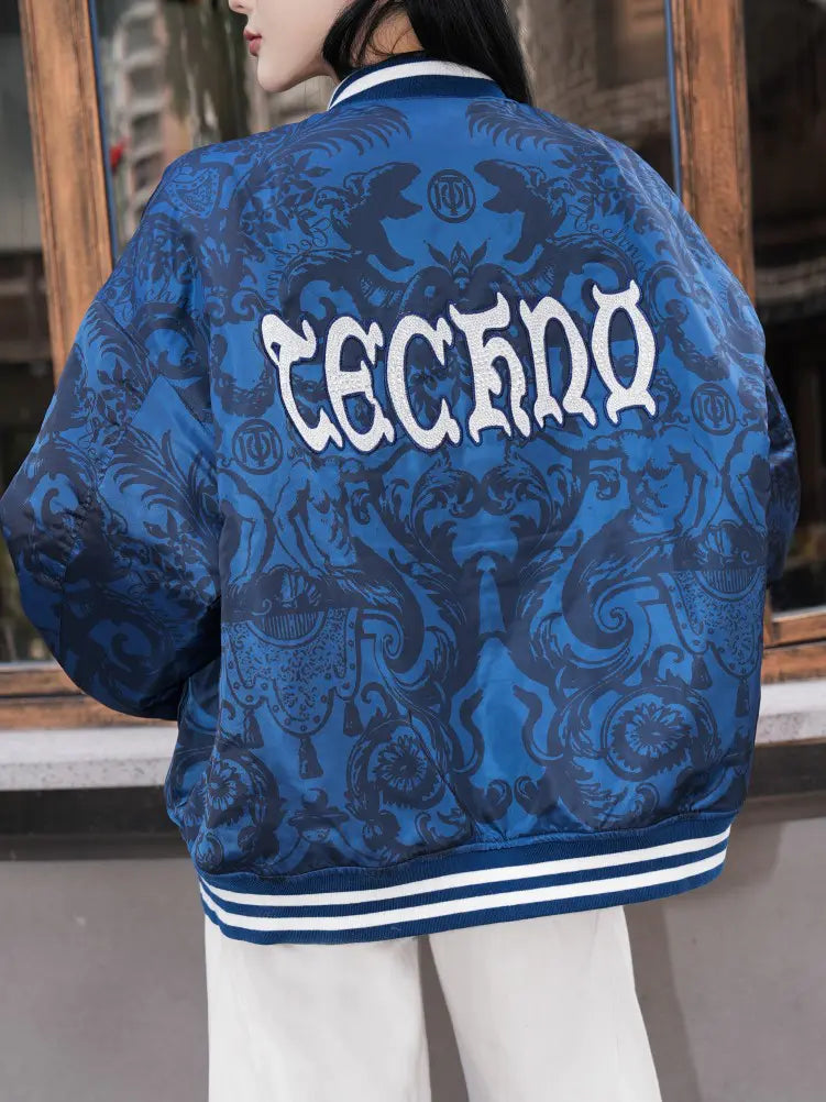 TCH Blue Baroque Pattern Embroidered Varsity Jacket TCH blue varsity jacket Blue baroque pattern jacket Gothic graphic varsity jacket Navy blue streetwear jacket Baroque print bomber jacket Embroidered varsity jacket Gothic lettering jacket Blue snap-button jacket Ornamental print streetwear jacket TCH graphic bomber jacket