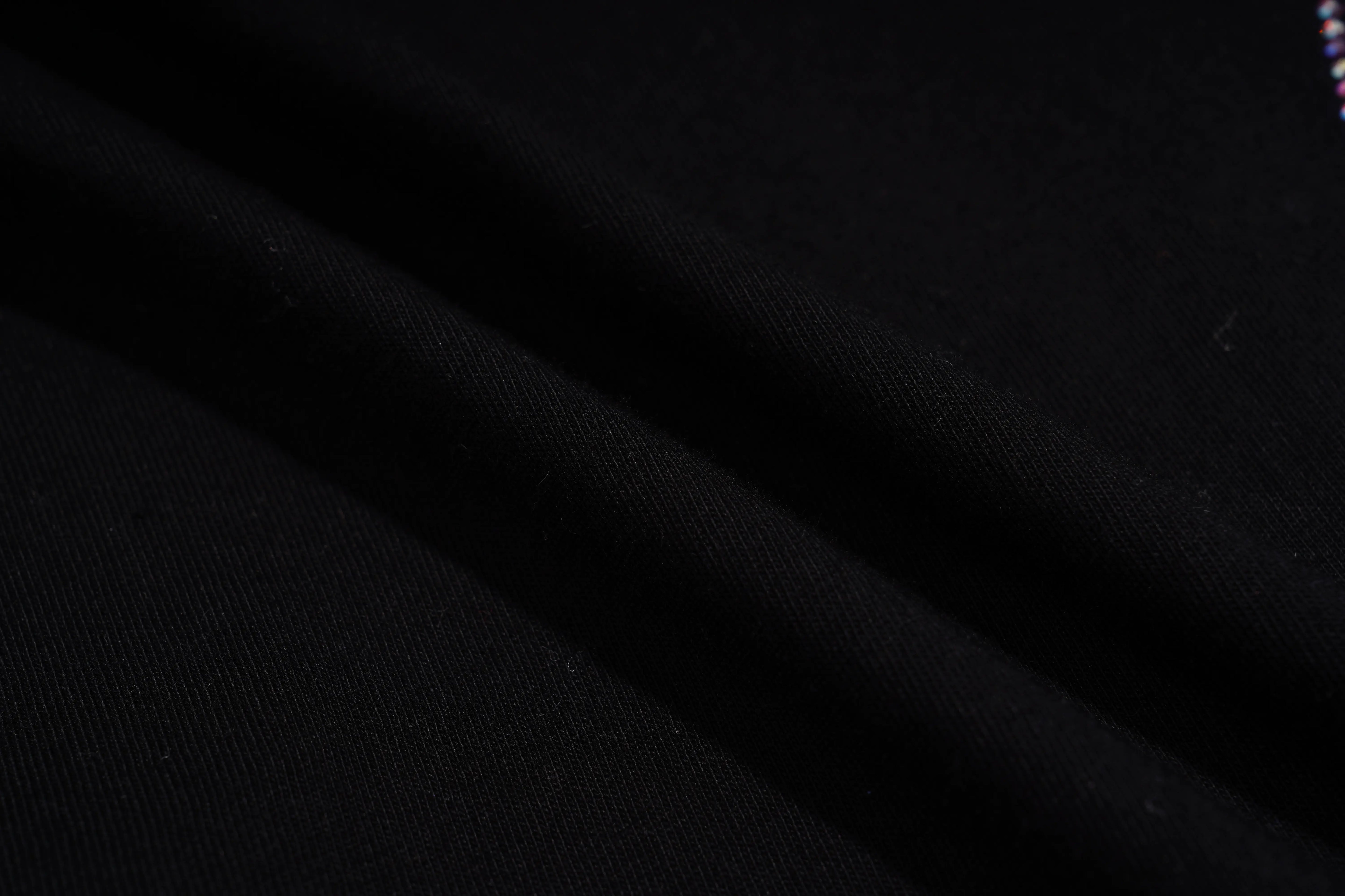 Close-up of black fabric texture, TCH Chihuahua Bow Rhinestone T-Shirt