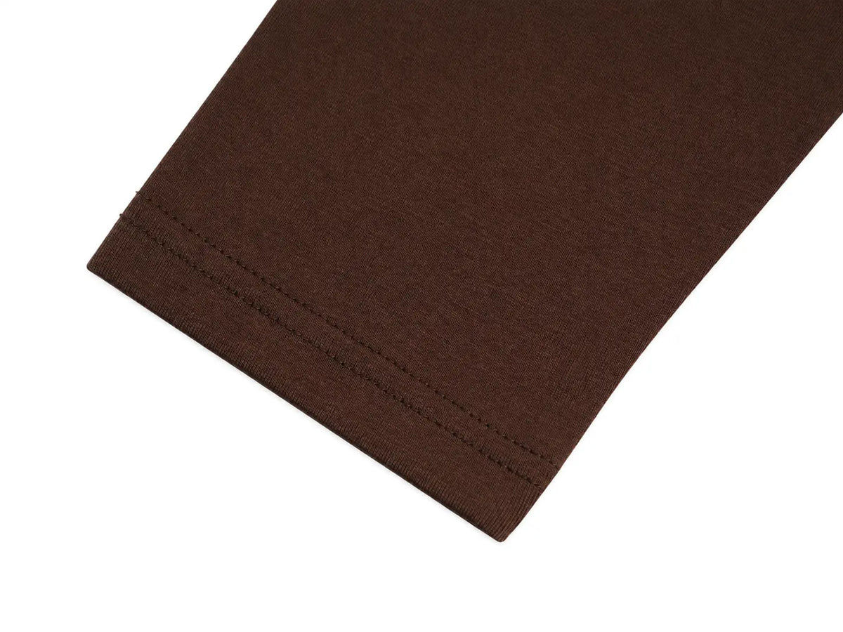 A close-up of a dark brown fabric sleeve or cuff with double stitching along the hem, shown on a plain white background. TCH Cute Lamb Pink Striped Raglan Long Sleeve Top