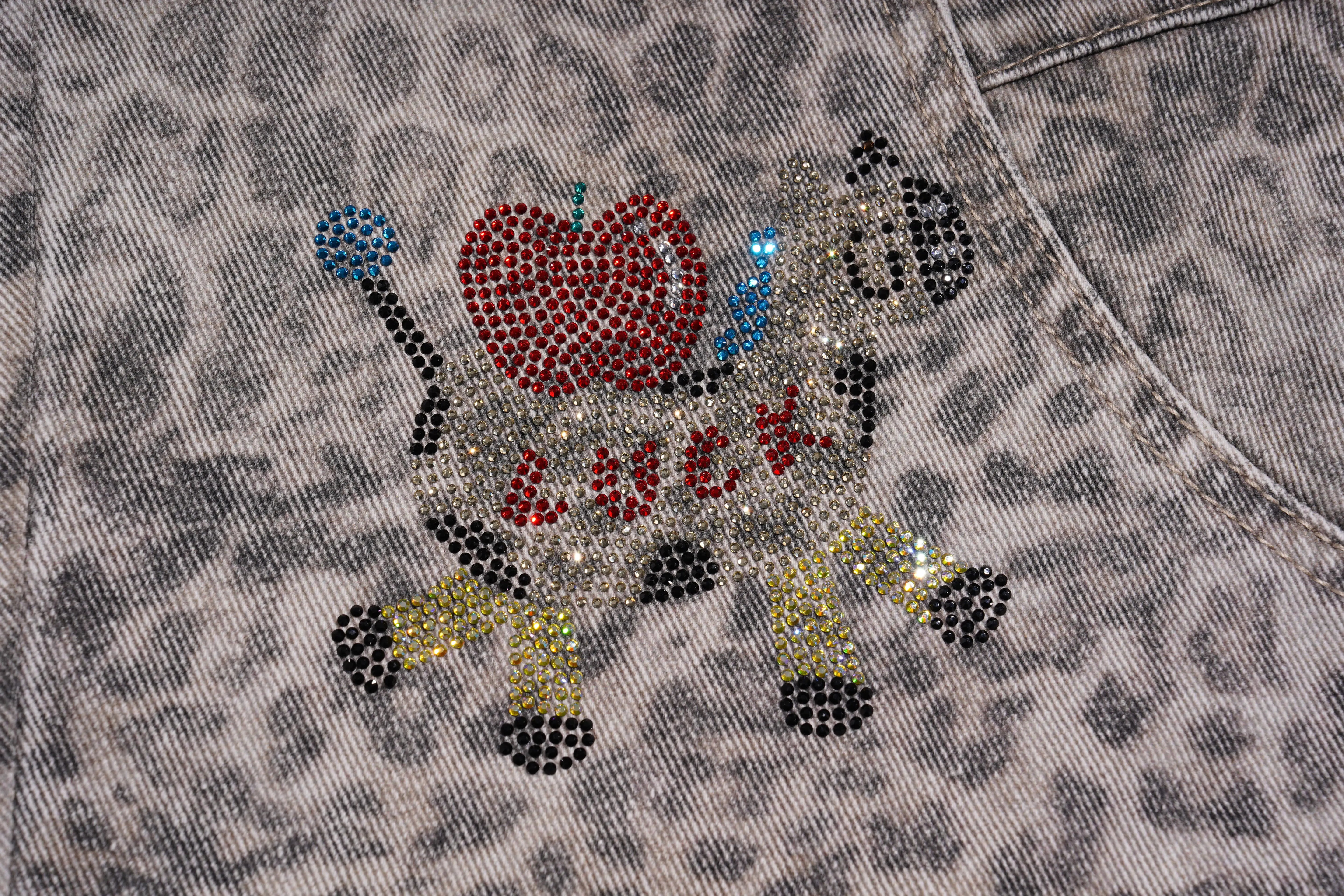 Decorative animal design with rhinestones on a textured fabric background, TCH Cute Pony Rhinestone Grey Leopard Wide-Leg Jeans