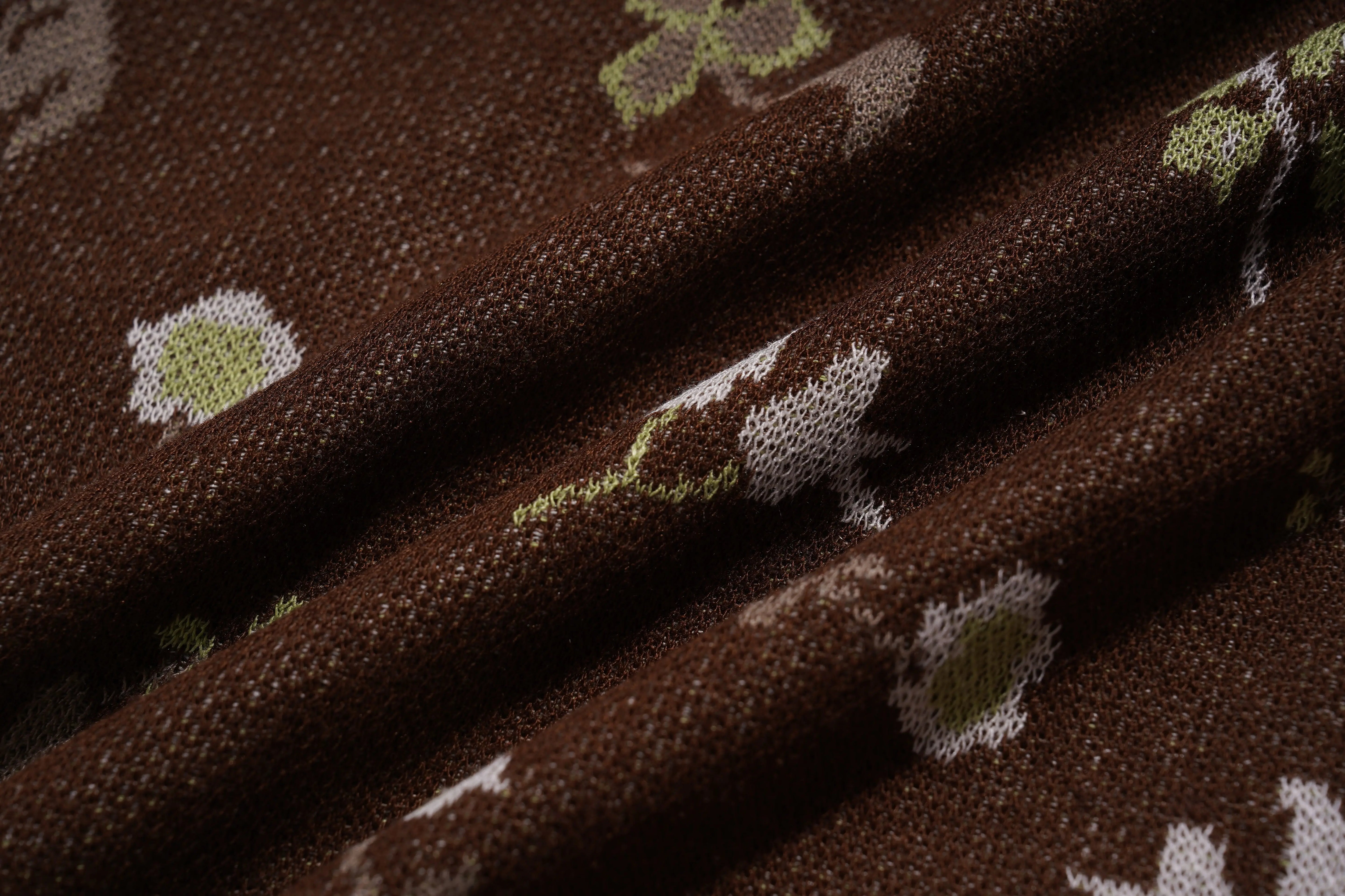 Close-up of brown fabric with leaf pattern, TCH Floral Rhinestone Accent Sweatpants