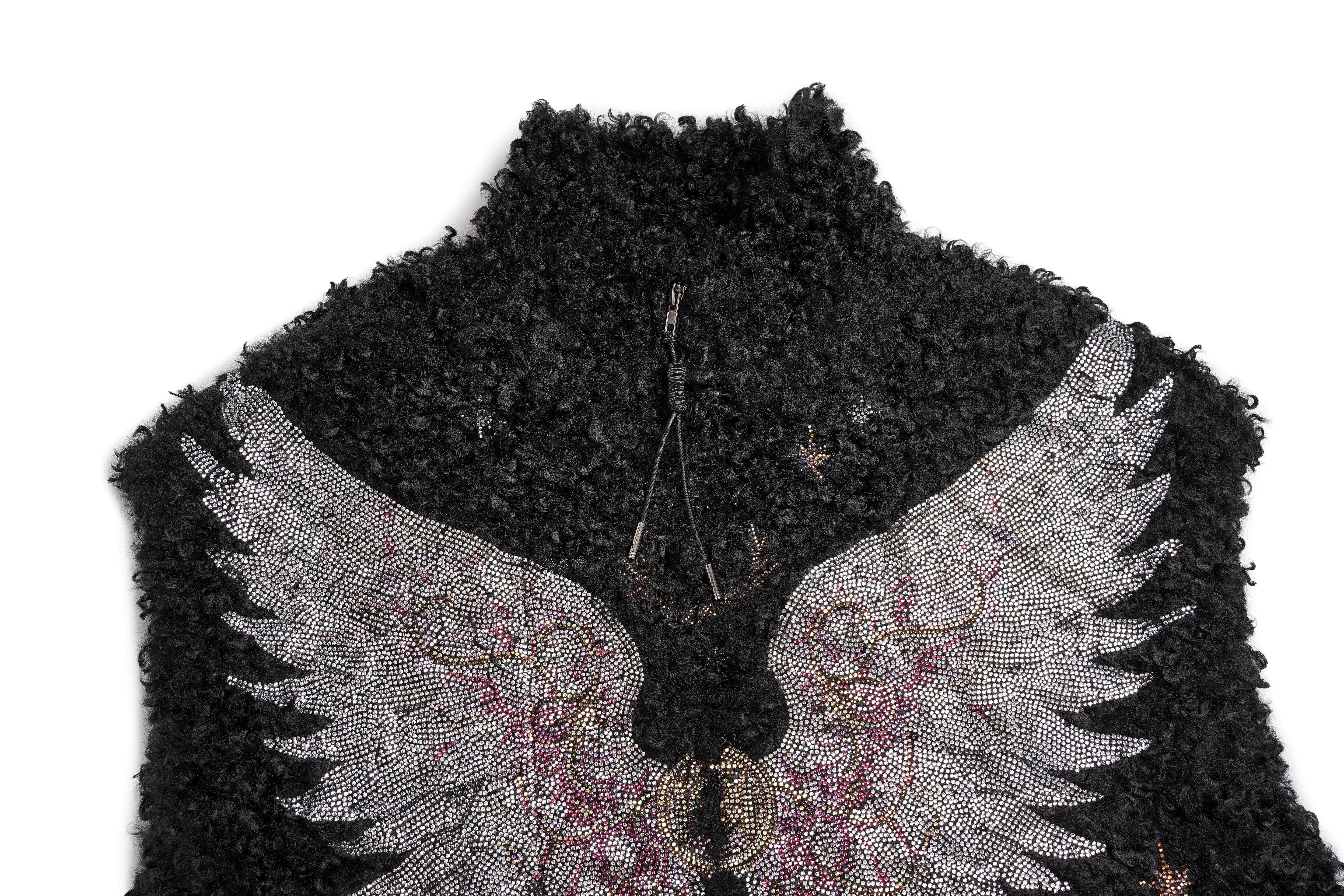 Black textured fabric with silver embroidered wings on a white background, TCH Fuzzy Rhinestone Wings High-Neck Zip Sleeveless Vest