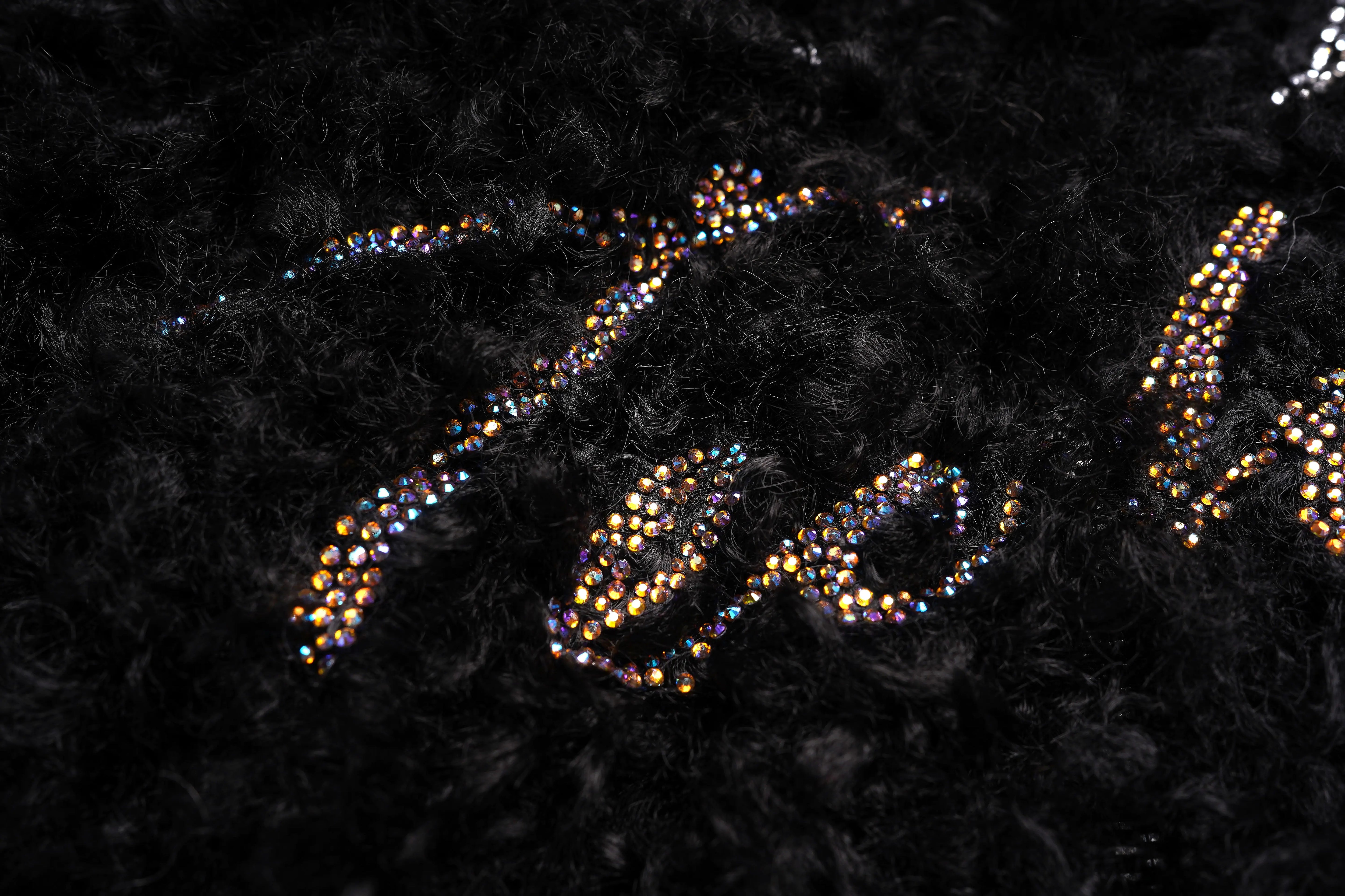 Decorative text with rhinestones on a textured black background, TCH Fuzzy Rhinestone Wings High-Neck Zip Sleeveless Vest