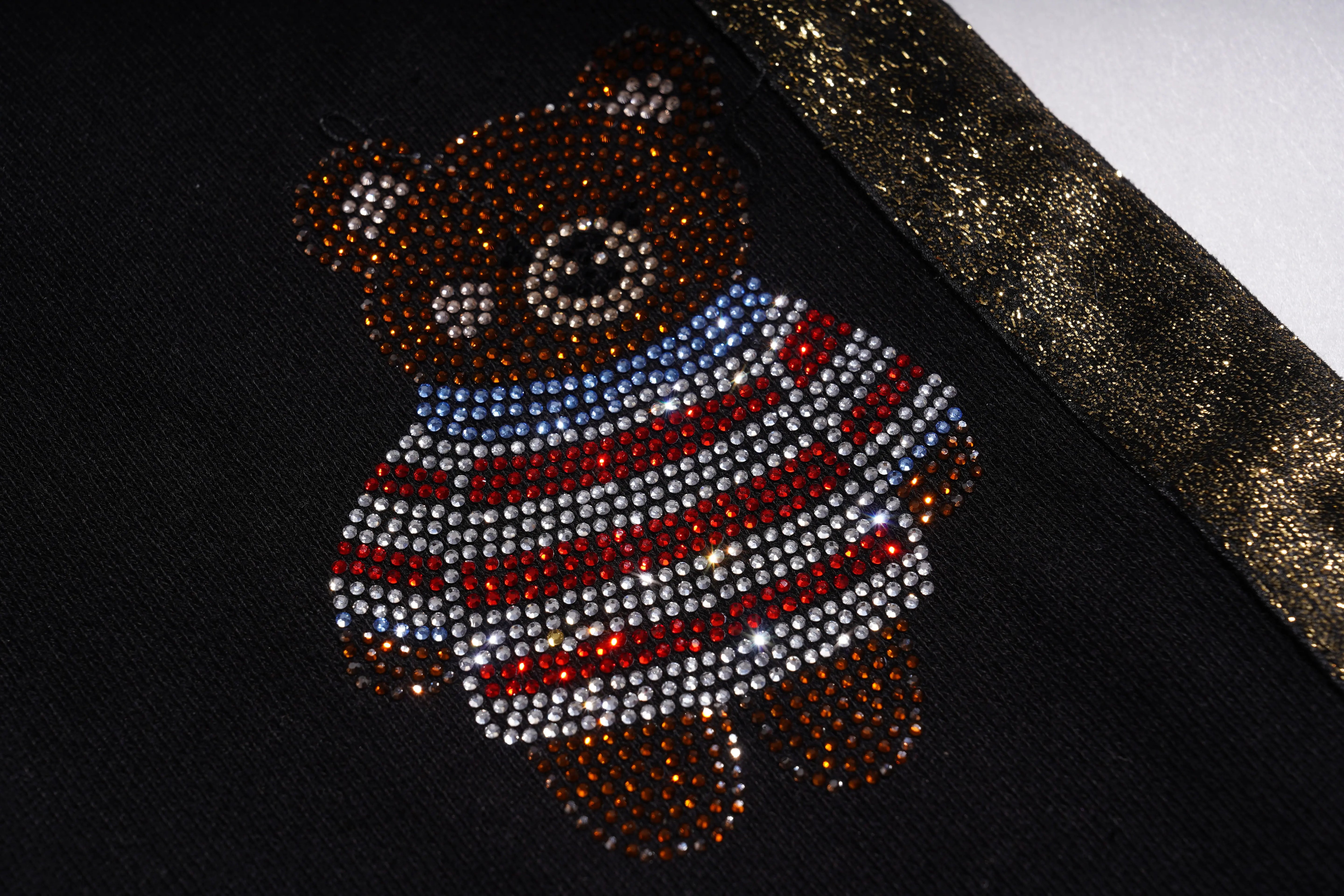 Teddy bear with a striped sweater made of rhinestones on a black background, TCH Galaxy Rhinestone Black Jogger Pants Luxury Streetwear Brand Official Showcase