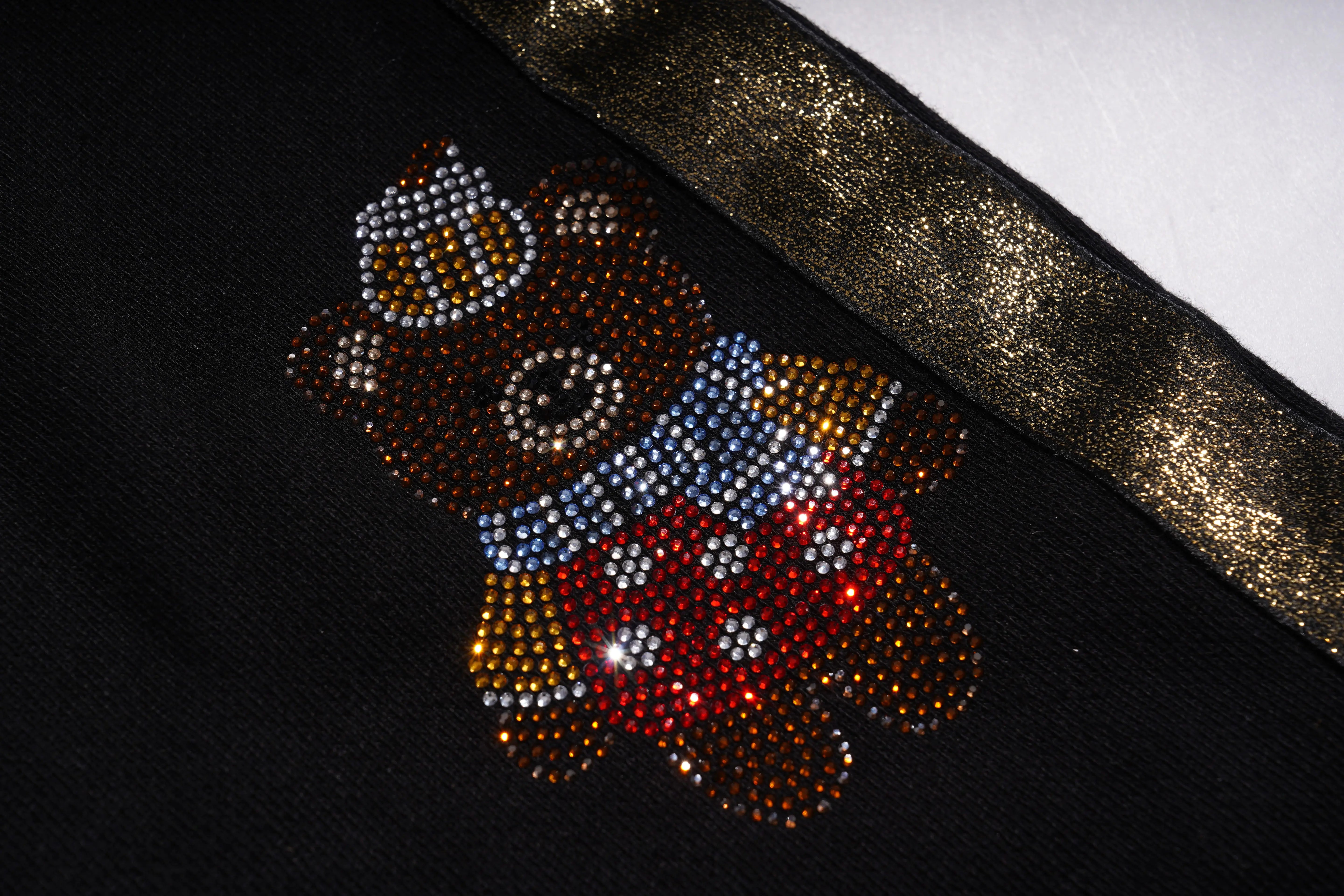 Decorative bear design with rhinestones on a black background, TCH Galaxy Rhinestone Black Jogger Pants Luxury Streetwear Brand Official Showcase