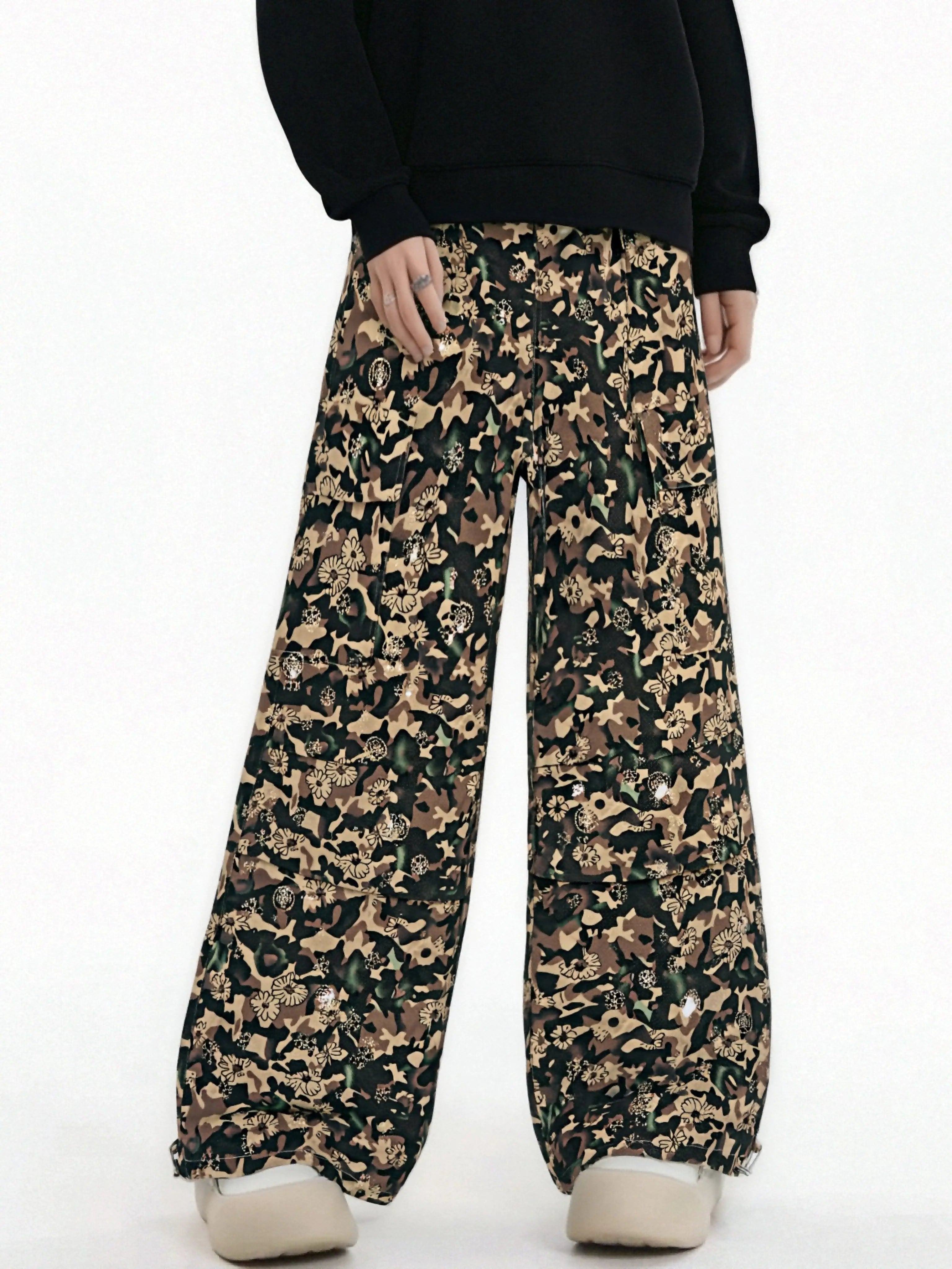 Camouflage pants worn by a person on a white background, TCH Gold Snowflake Rhinestone Camo Denim Jeans