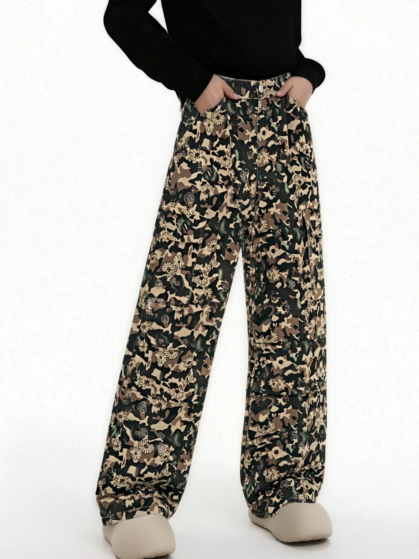 Camouflage-patterned pants worn by a person on a white background, TCH Gold Snowflake Rhinestone Camo Denim Jeans