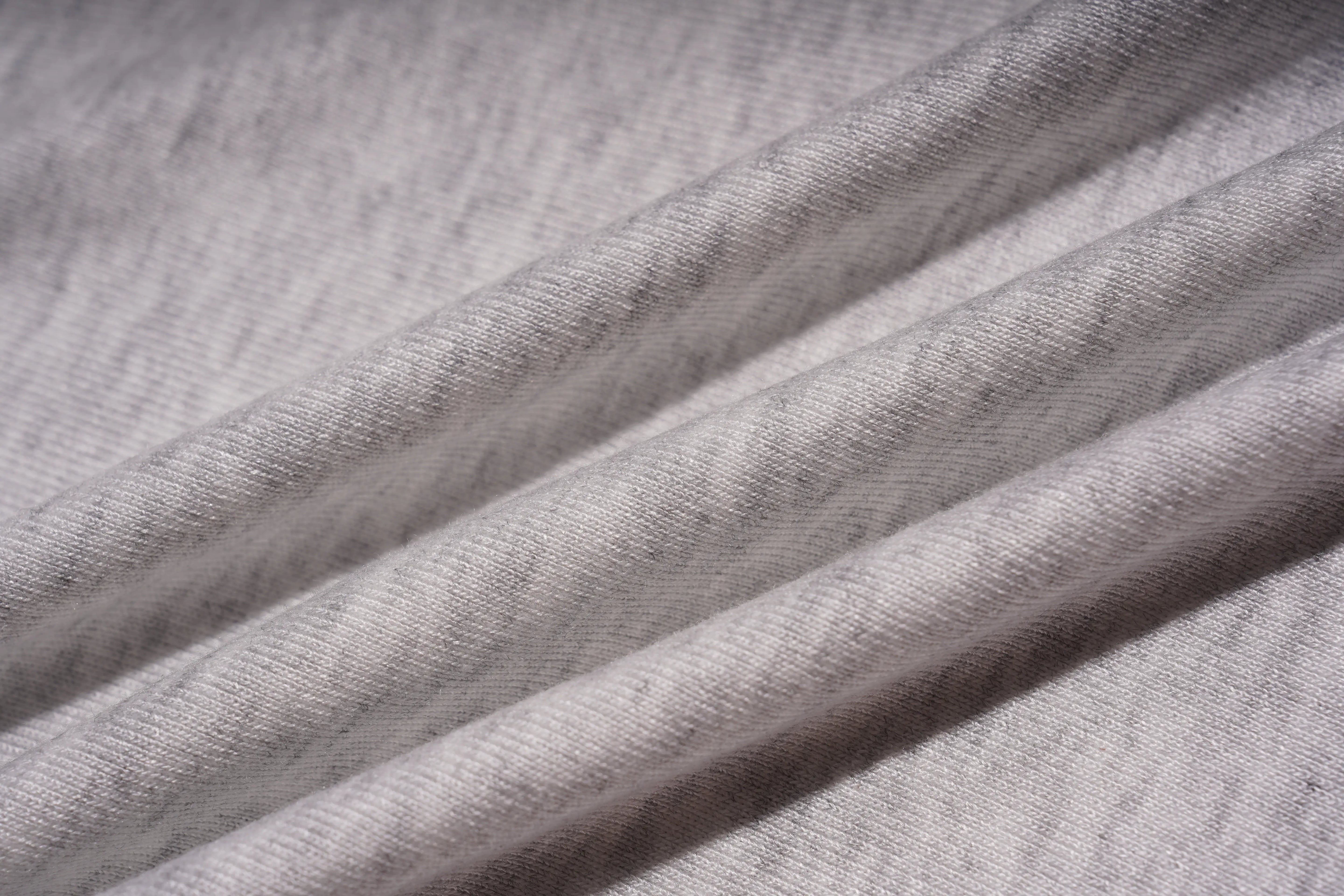 Close-up of gray fabric with visible texture, TCH Grey Rhinestone Butterfly Pajama Set