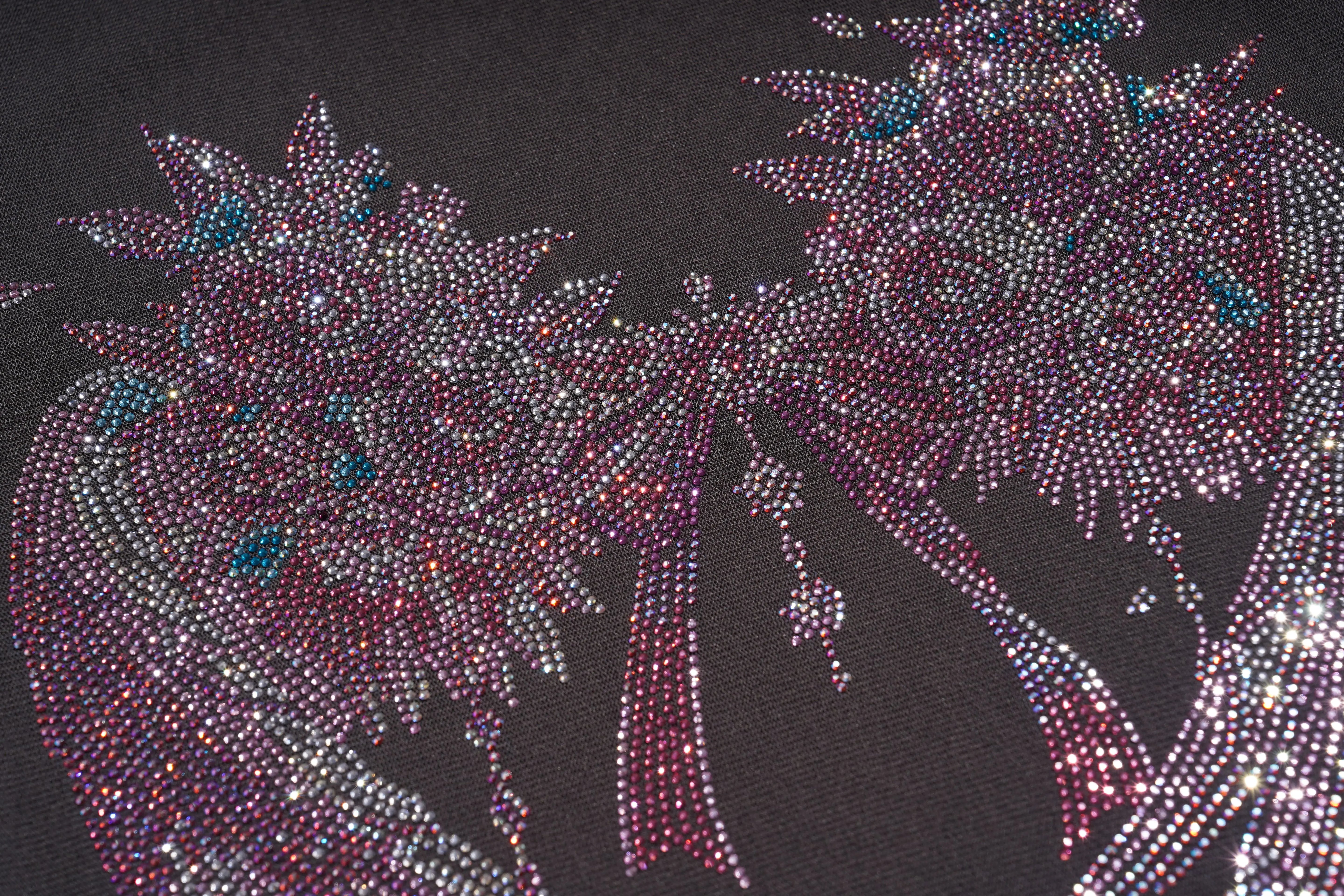 Close-up of a decorative design with rhinestones on a black background, TCH Grey Rhinestone Pink Wings Graphic T-Shirt