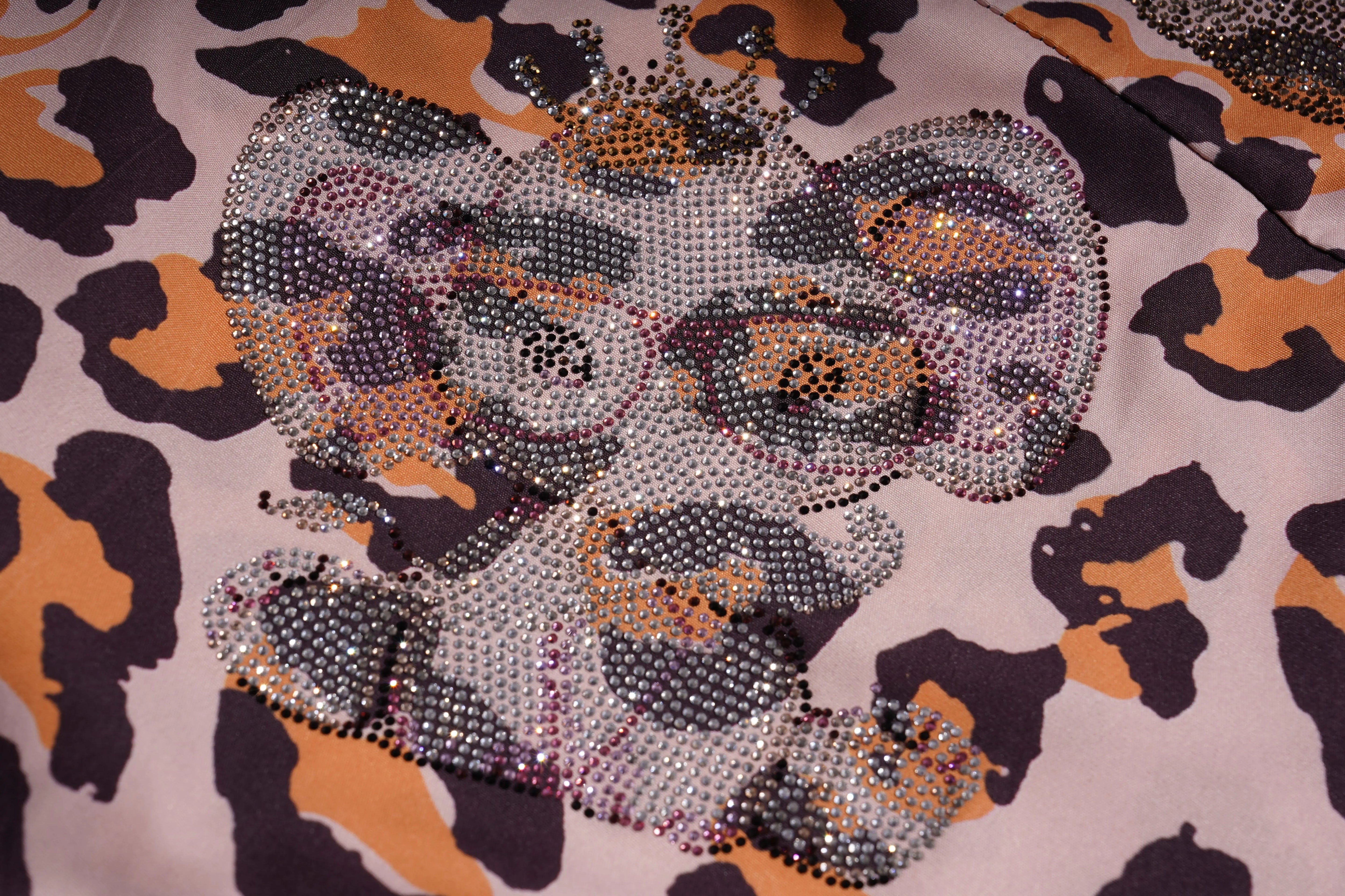 Decorative clutch with rhinestone design on a leopard print background, TCH Leopard Rhinestone Animal Embellished Dress