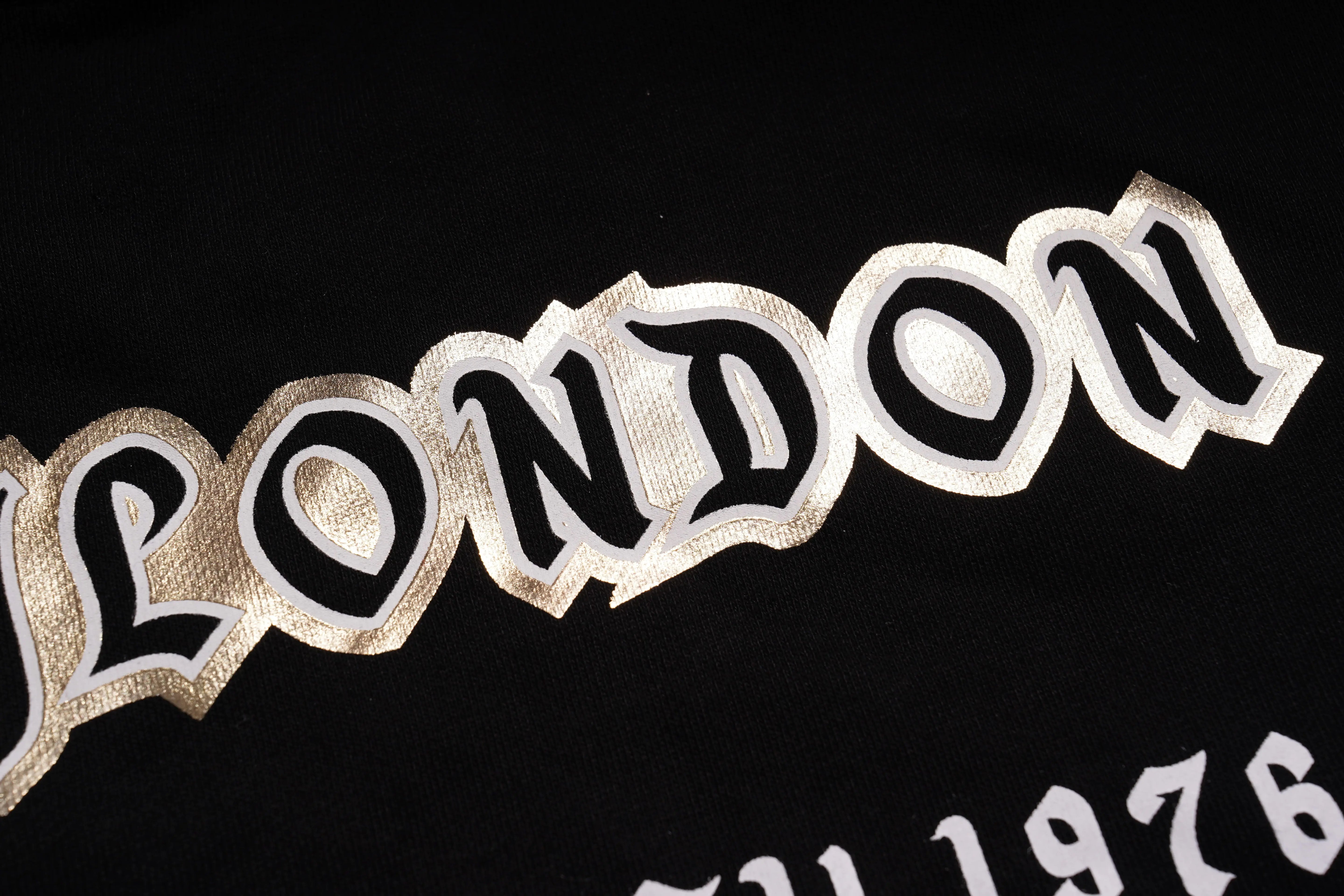 Decorative border with 'LONDON' text on a black background, TCH Lucky Pig Rhinestone Sweatshirt