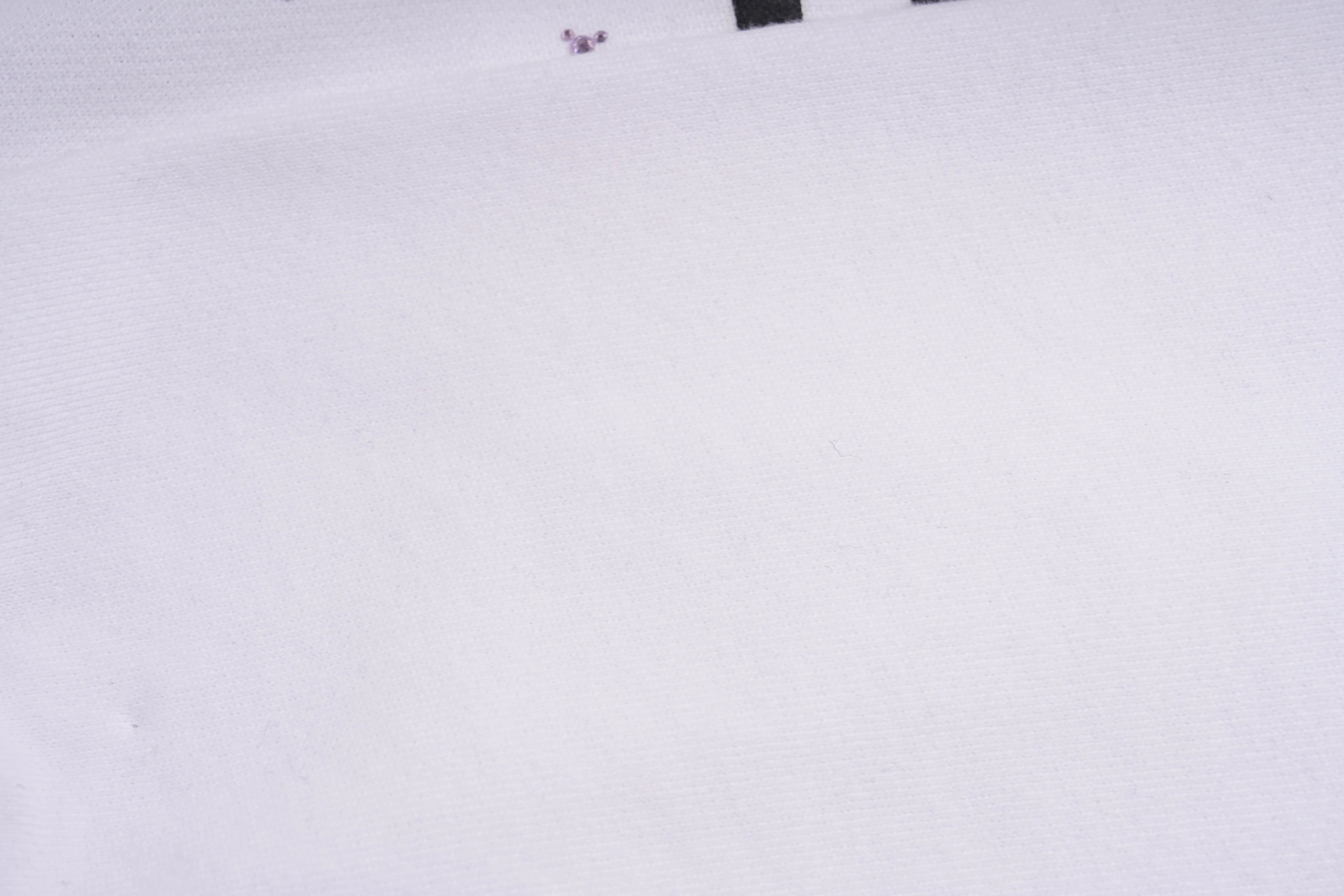 White background with a small red object in the top left corner