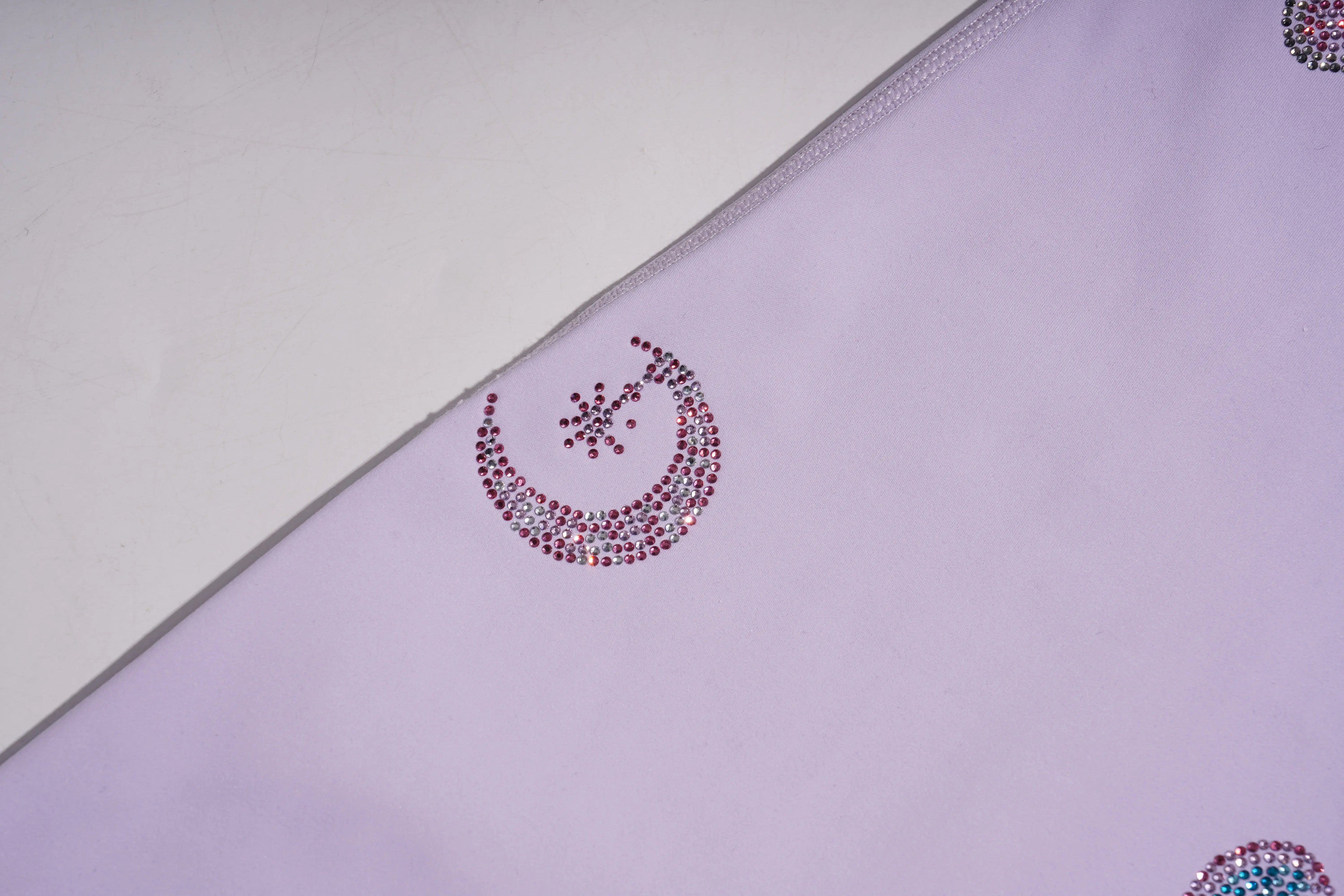 Purple fabric with decorative pink and blue pattern on a white background, TCH Moonlight Rhinestone Wide-Leg Pants