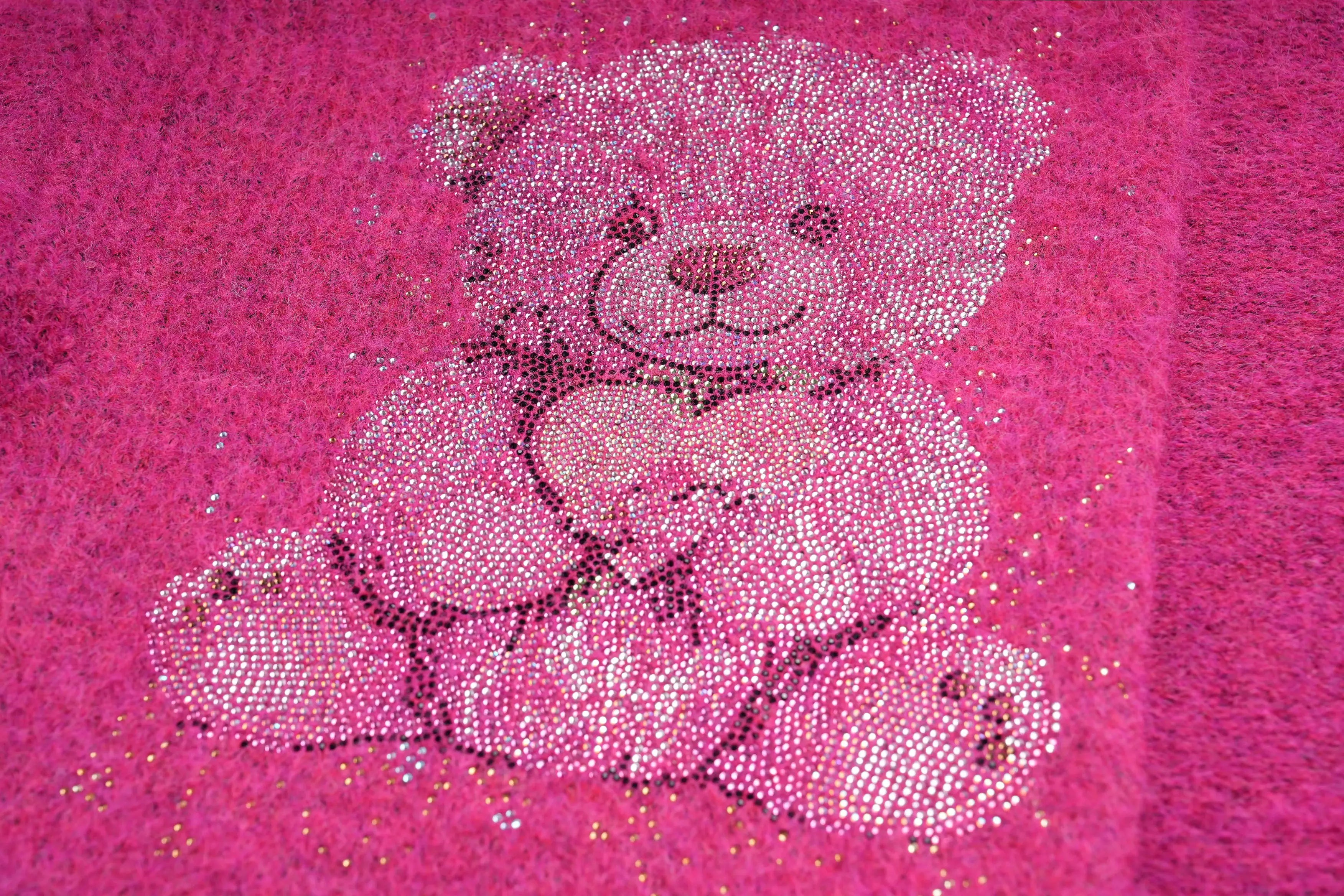Teddy bear made of pink rhinestones on a pink background, TCH Pink Rhinestone Bear Knit Cardigan