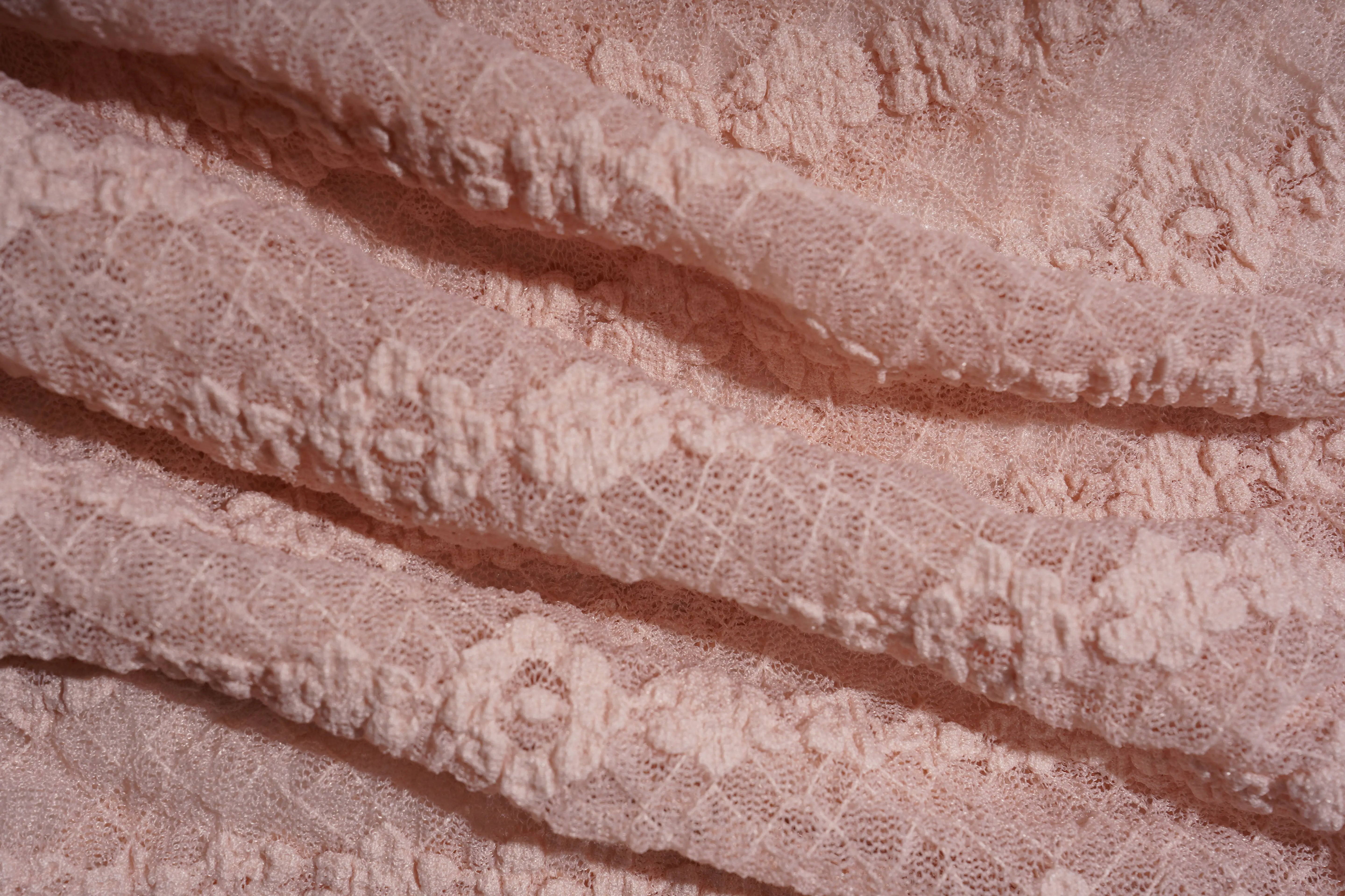 Close-up of lace fabric with a floral pattern, TCH Pink Rhinestone Bow Lace Layered Dress