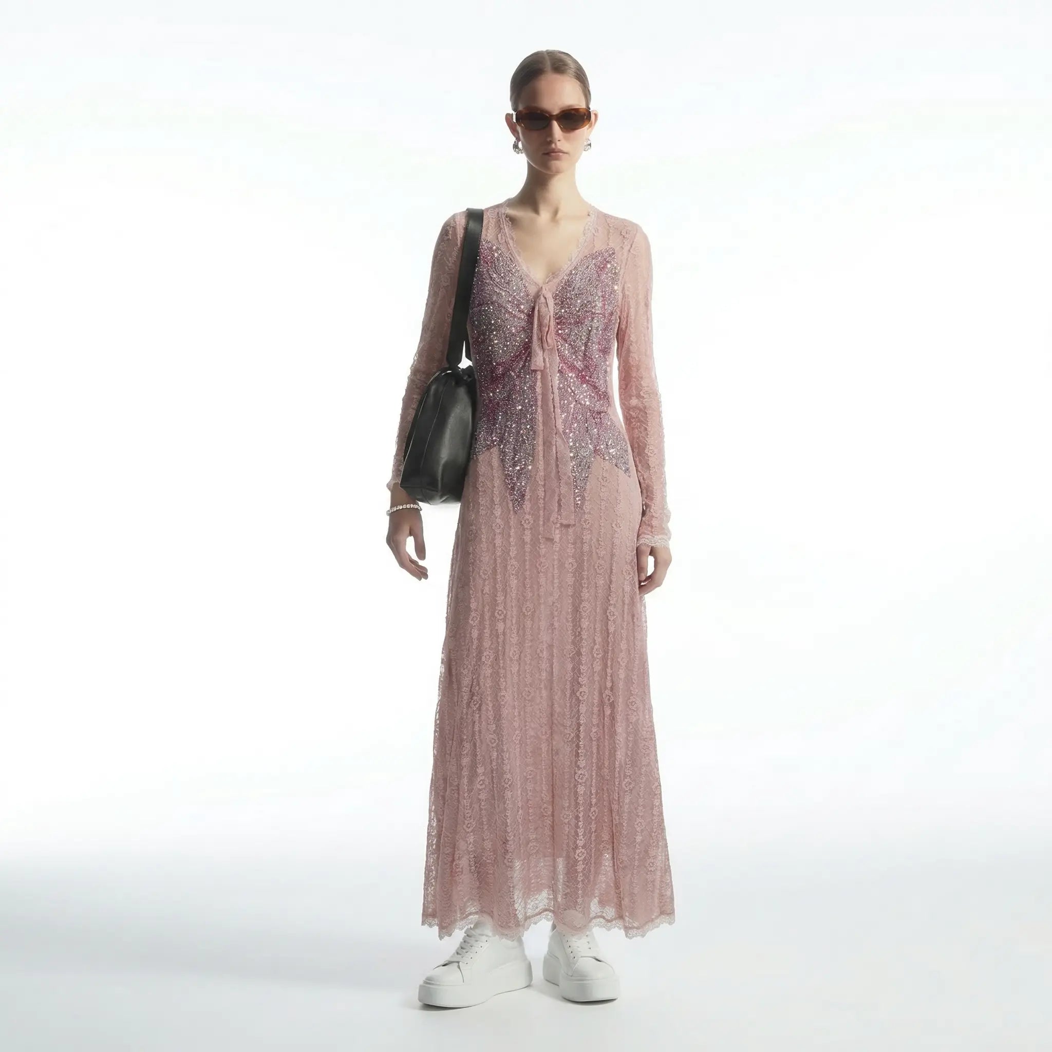 Woman wearing a long pink dress with a black bag on a white background, TCH Pink Rhinestone Bow Lace Layered Dress