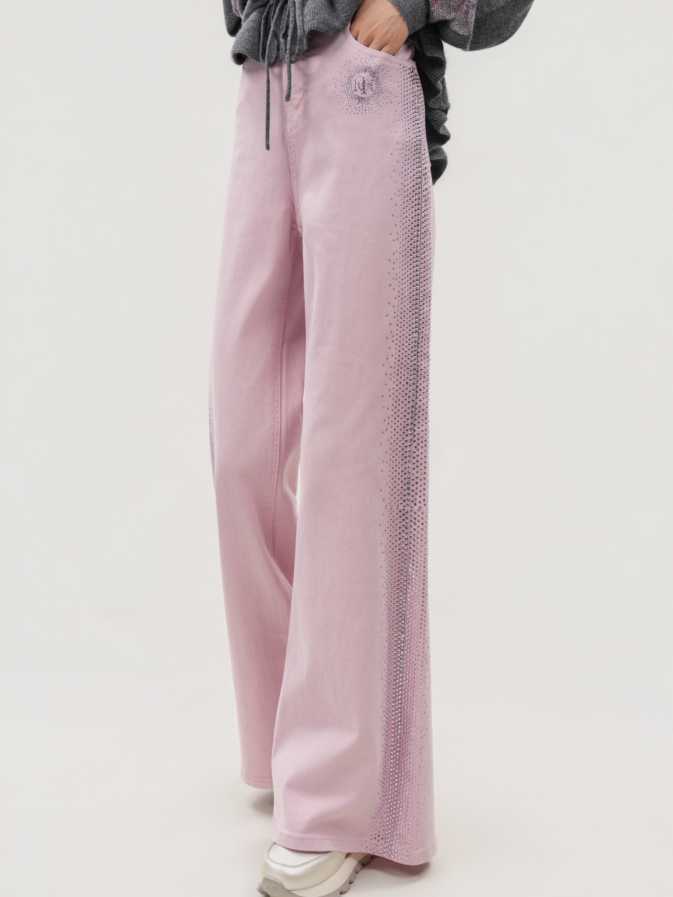 Pink pants worn by a person on a white background, TCH Pink Rhinestone Gradient Denim Jeans with Logo Detail