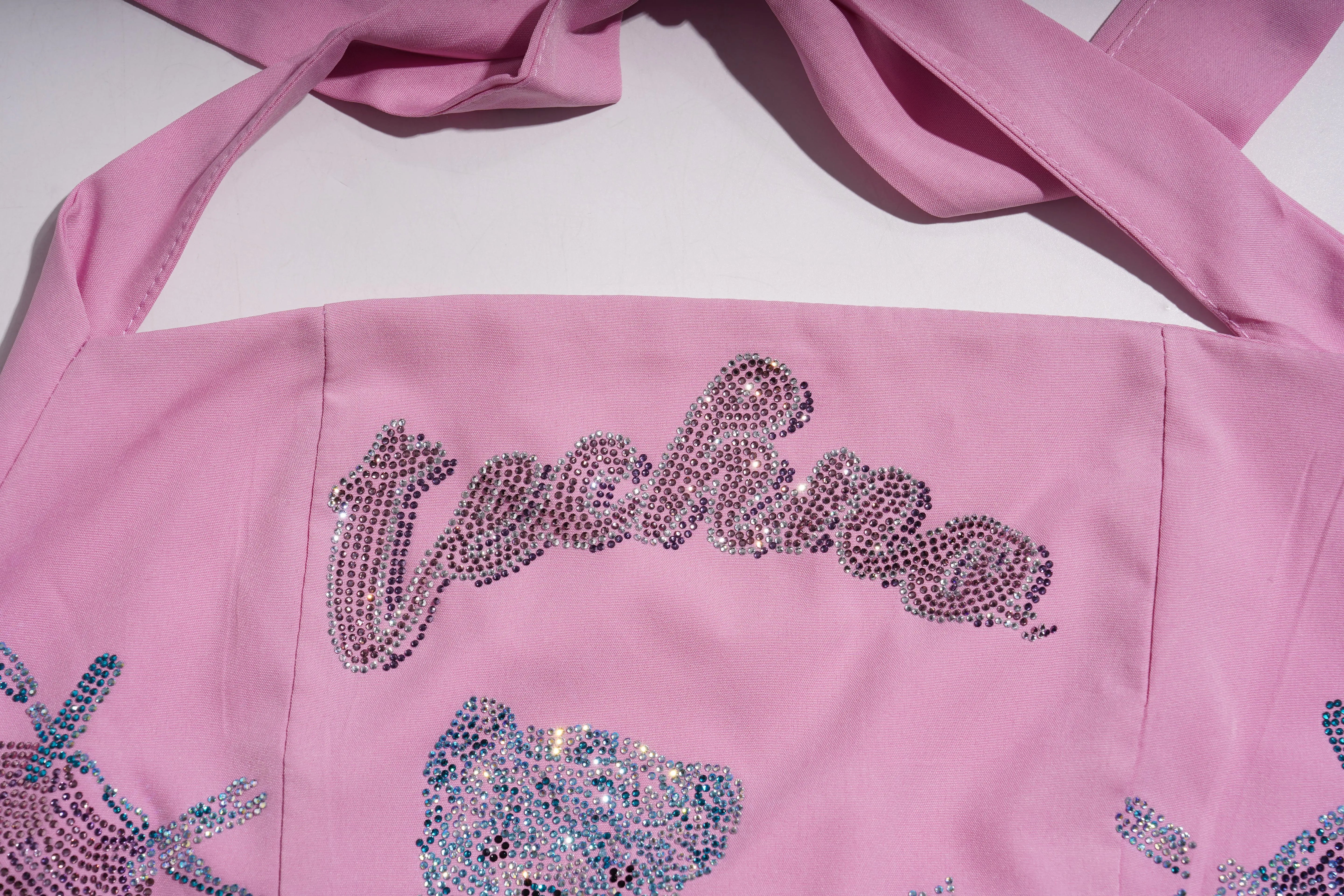 Pink jacket with 'Alpha' lettering and decorative elements on a white background, TCH Pink Rhinestone Teddy Laundry Story Dress