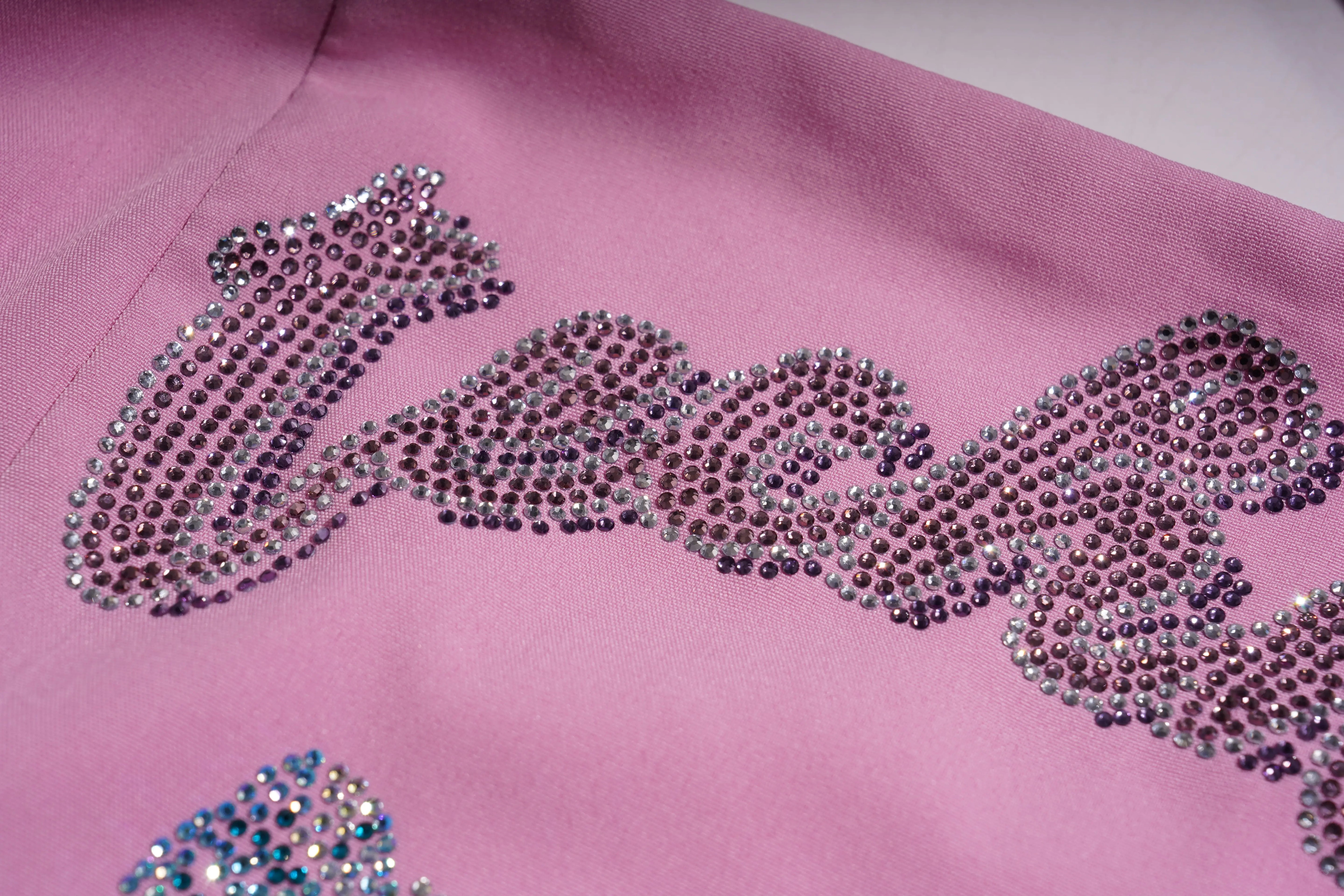 Pink fabric with decorative rhinestone design on a white background, TCH Pink Rhinestone Teddy Laundry Story Dress