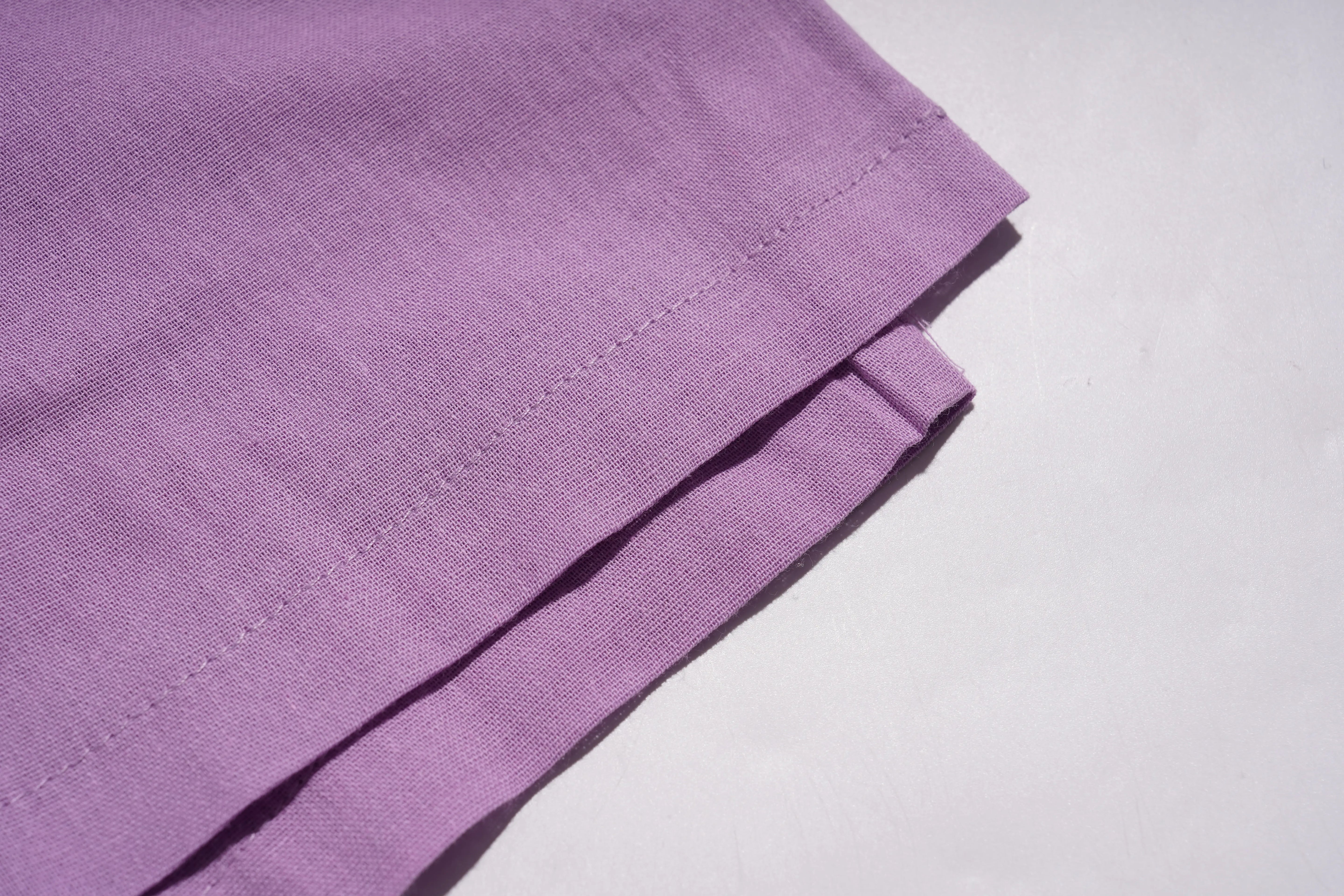 Folded purple fabric on a light gray background, TCH Purple Rhinestone Butterfly Set