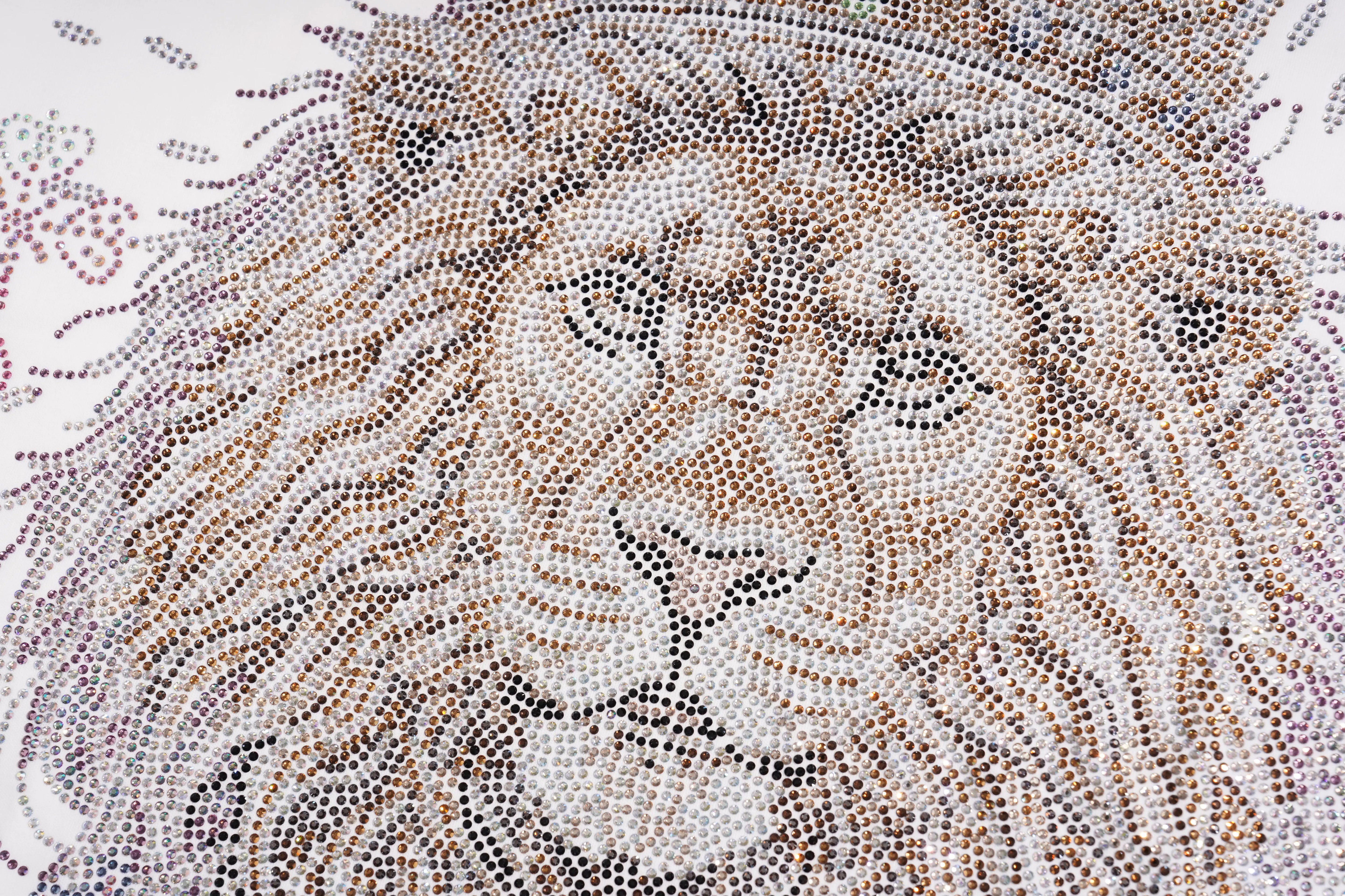 A close-up of a lion face artwork made from many small dots, with a crown above the head and a white background around it. TCH Regal Crown Lion Rhinestone Graphic T-Shirt