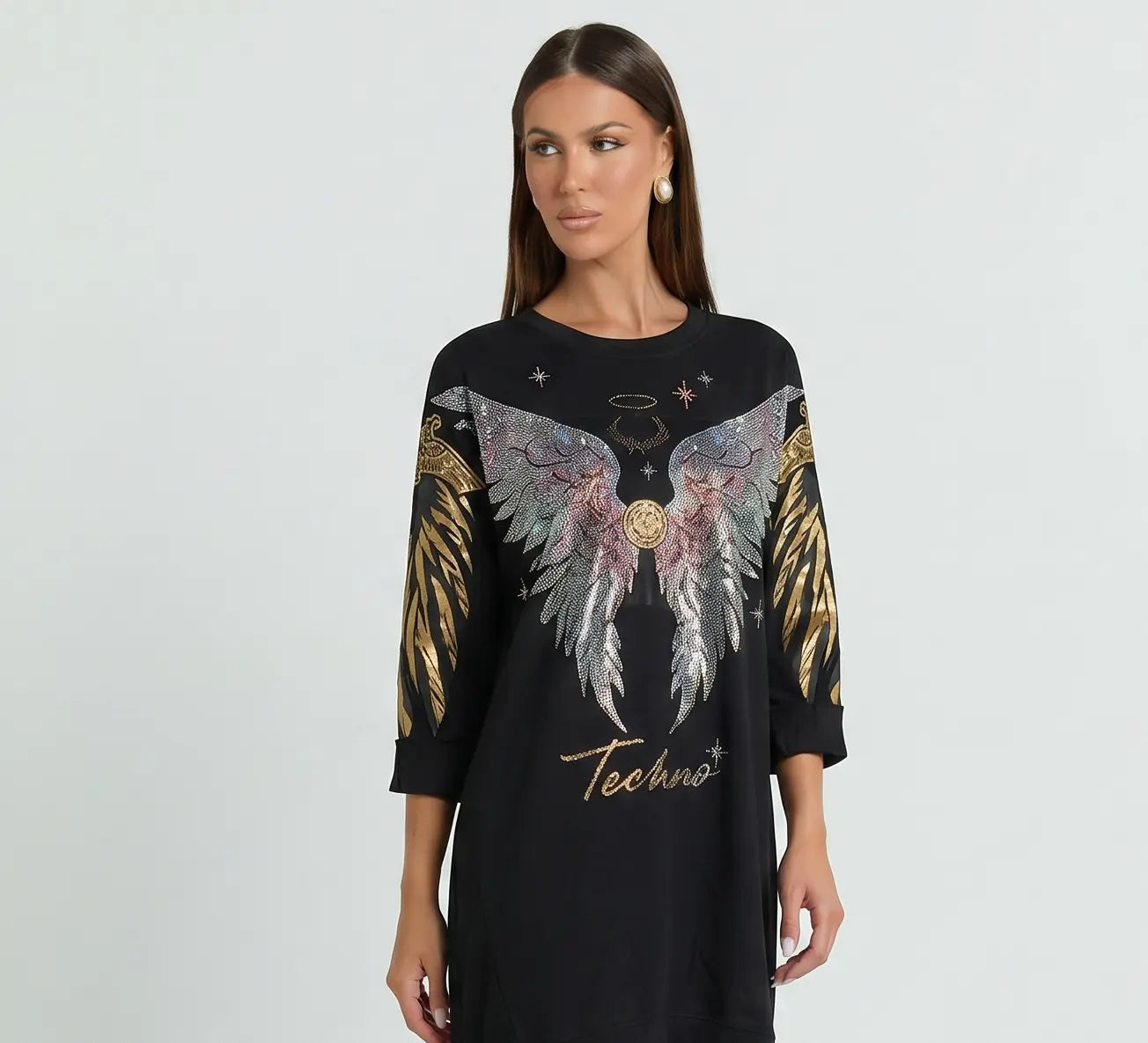 Woman wearing a black dress with angel wing design and 'Techno' text on a gray background, TCH Rhinestone Angel Wing Black Dress