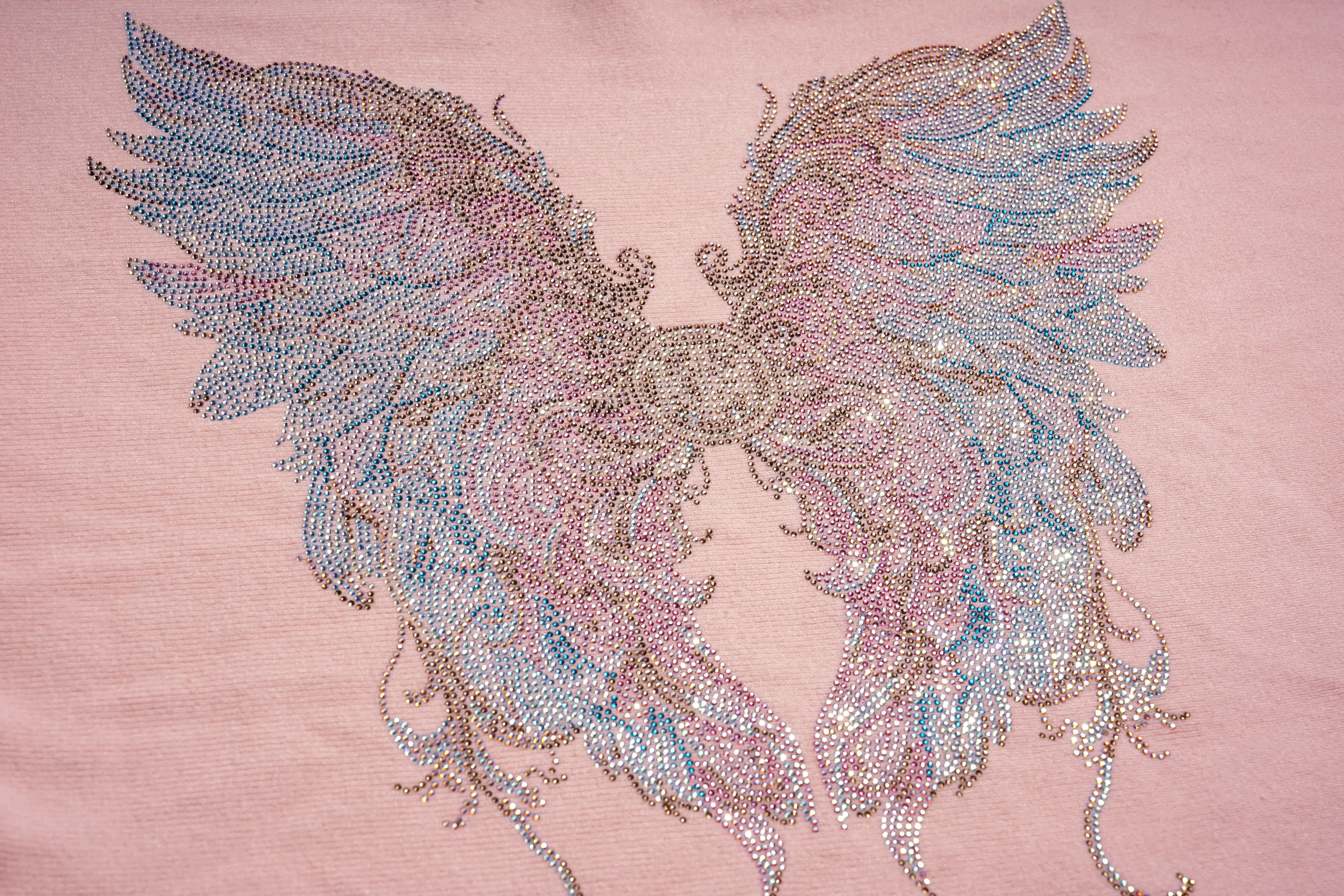 Decorative angel wings with rhinestones on a pink background, TCH Rhinestone Angel Wings Layered Knit Top & Wide-Leg Pants Set