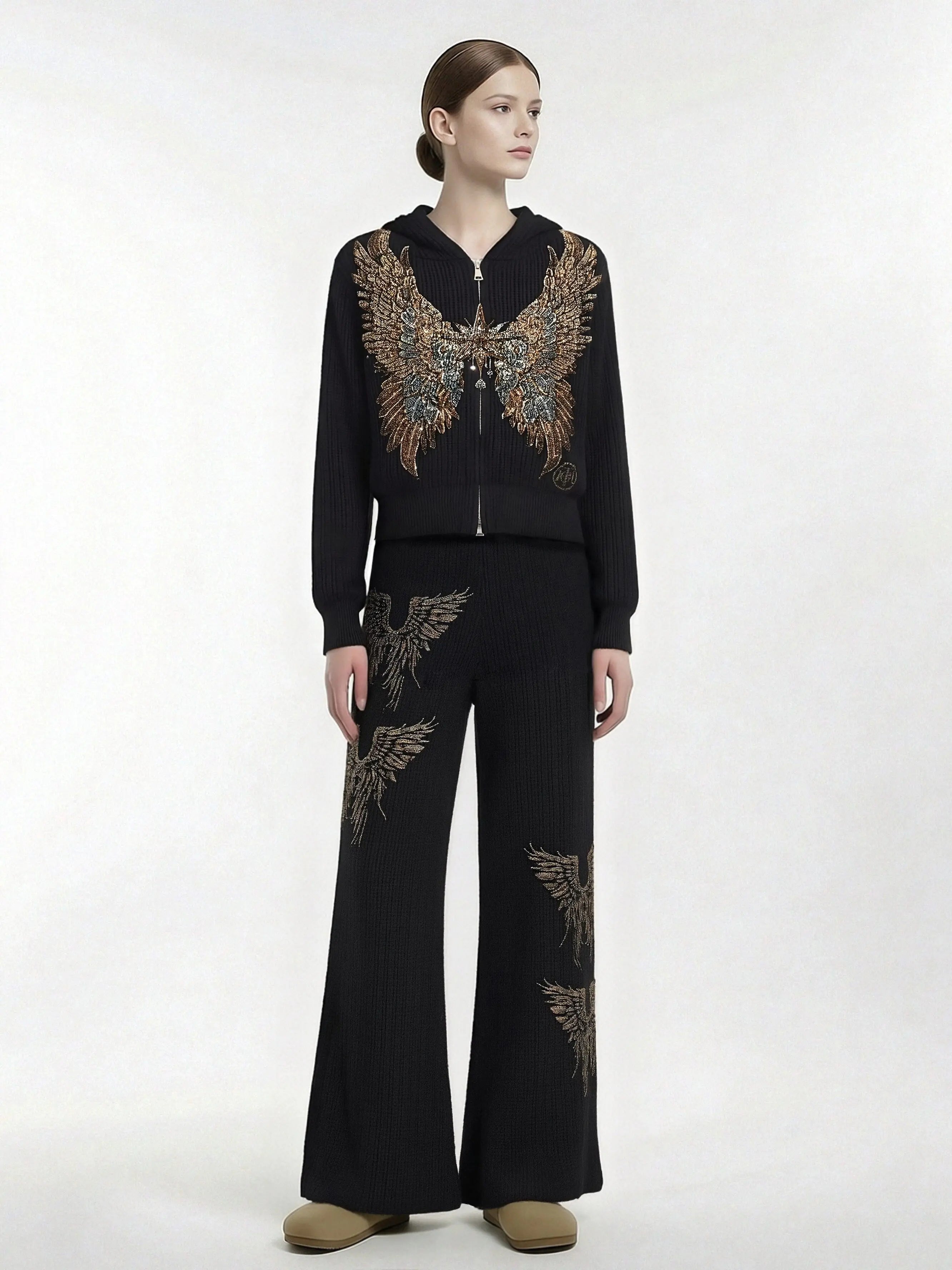 Person wearing a black outfit with butterfly patterns on a white background, TCH Rhinestone Angel Wings Zip Hoodie & Flare Pants Set