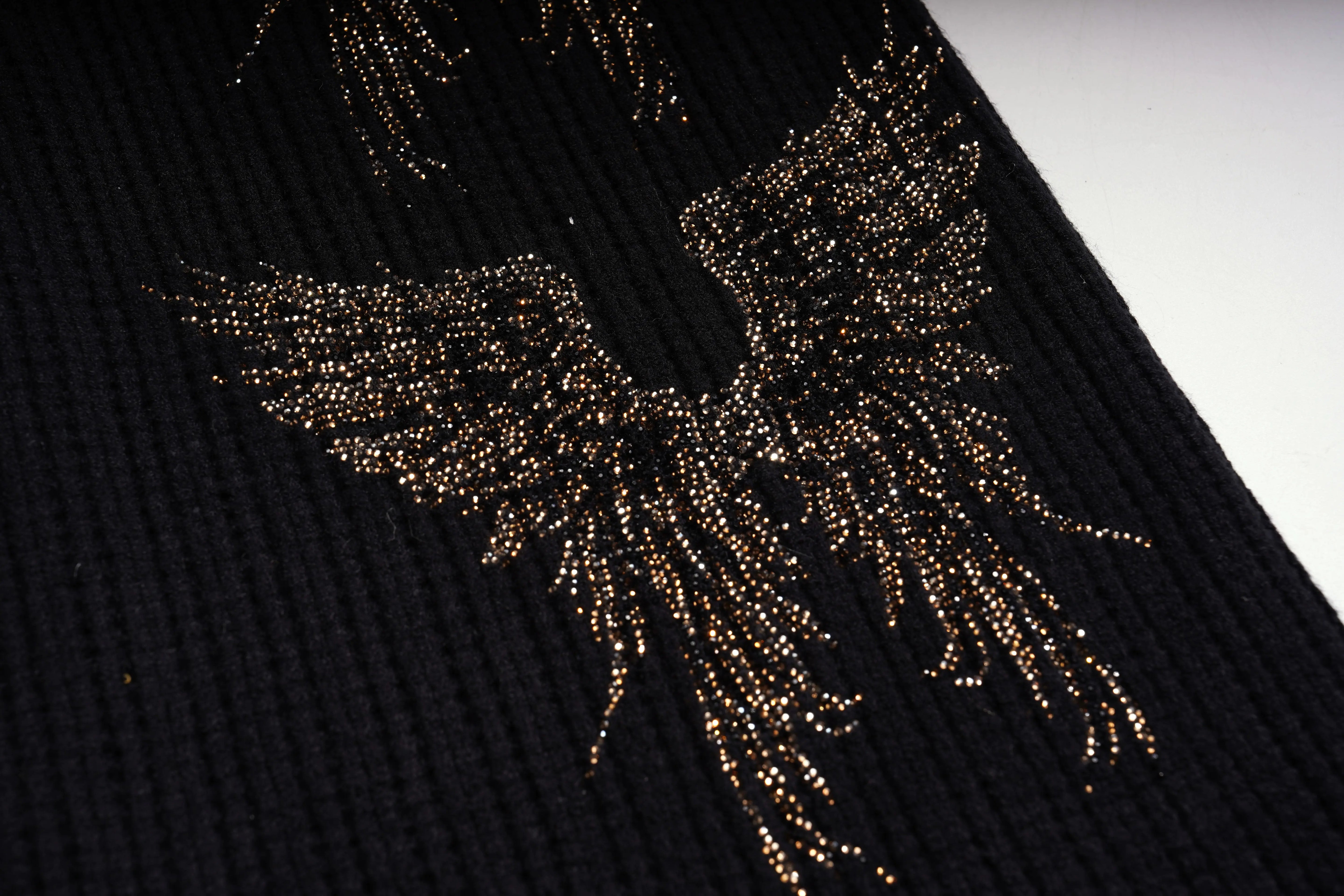Gold glittery phoenix design on a black textured background, TCH Rhinestone Angel Wings Zip Hoodie & Flare Pants Set