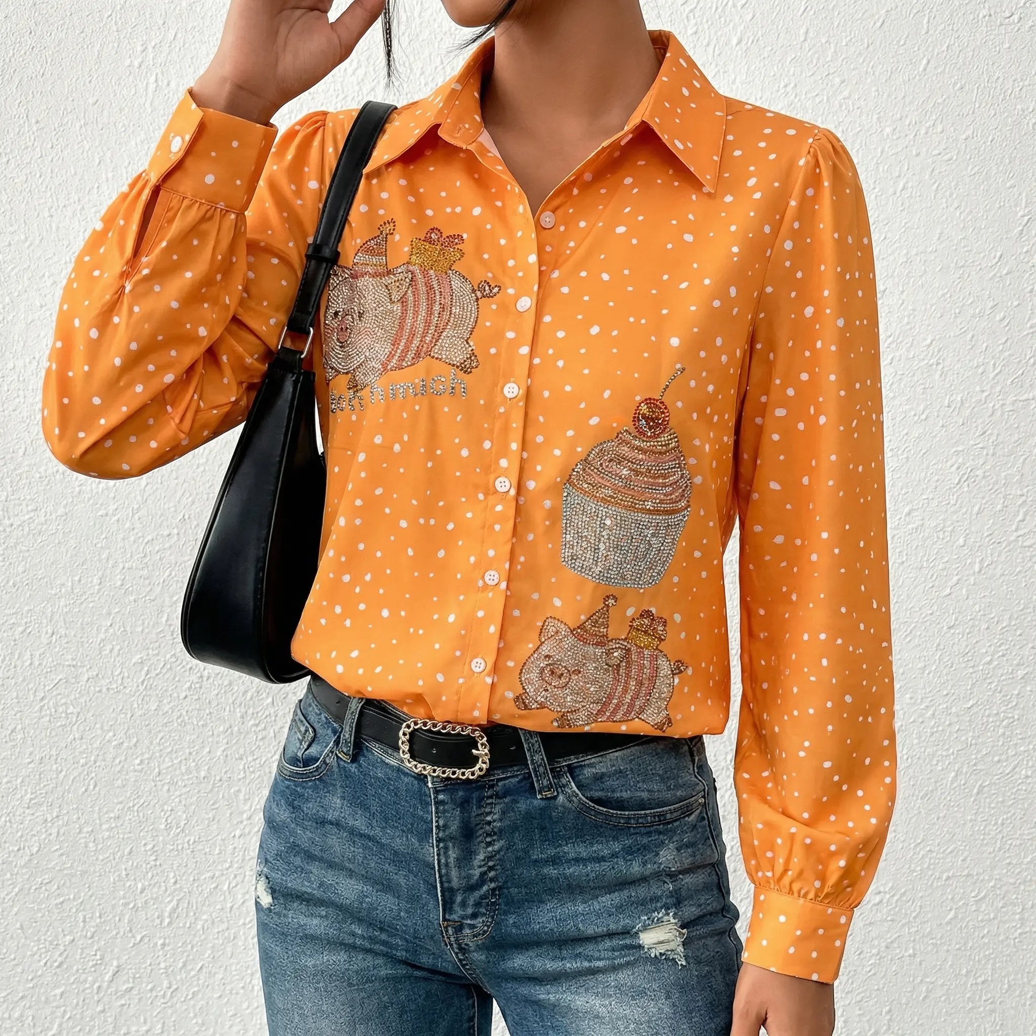 Person wearing an orange patterned shirt with a white background, TCH Rhinestone Animal Polka Dot Shirt