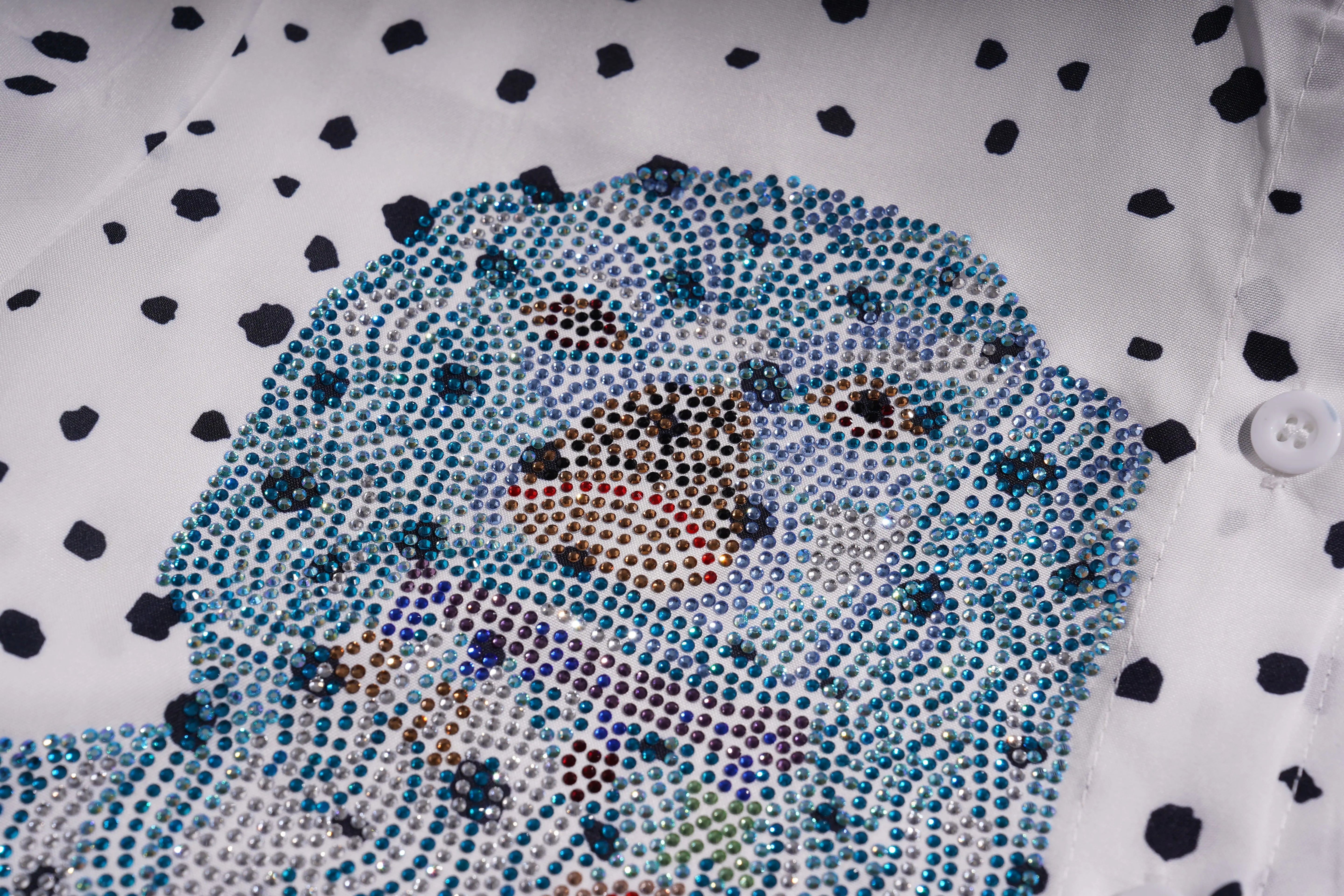 Close-up of a face made with rhinestones on a polka dot background, TCH Rhinestone Animal Polka Dot Shirt