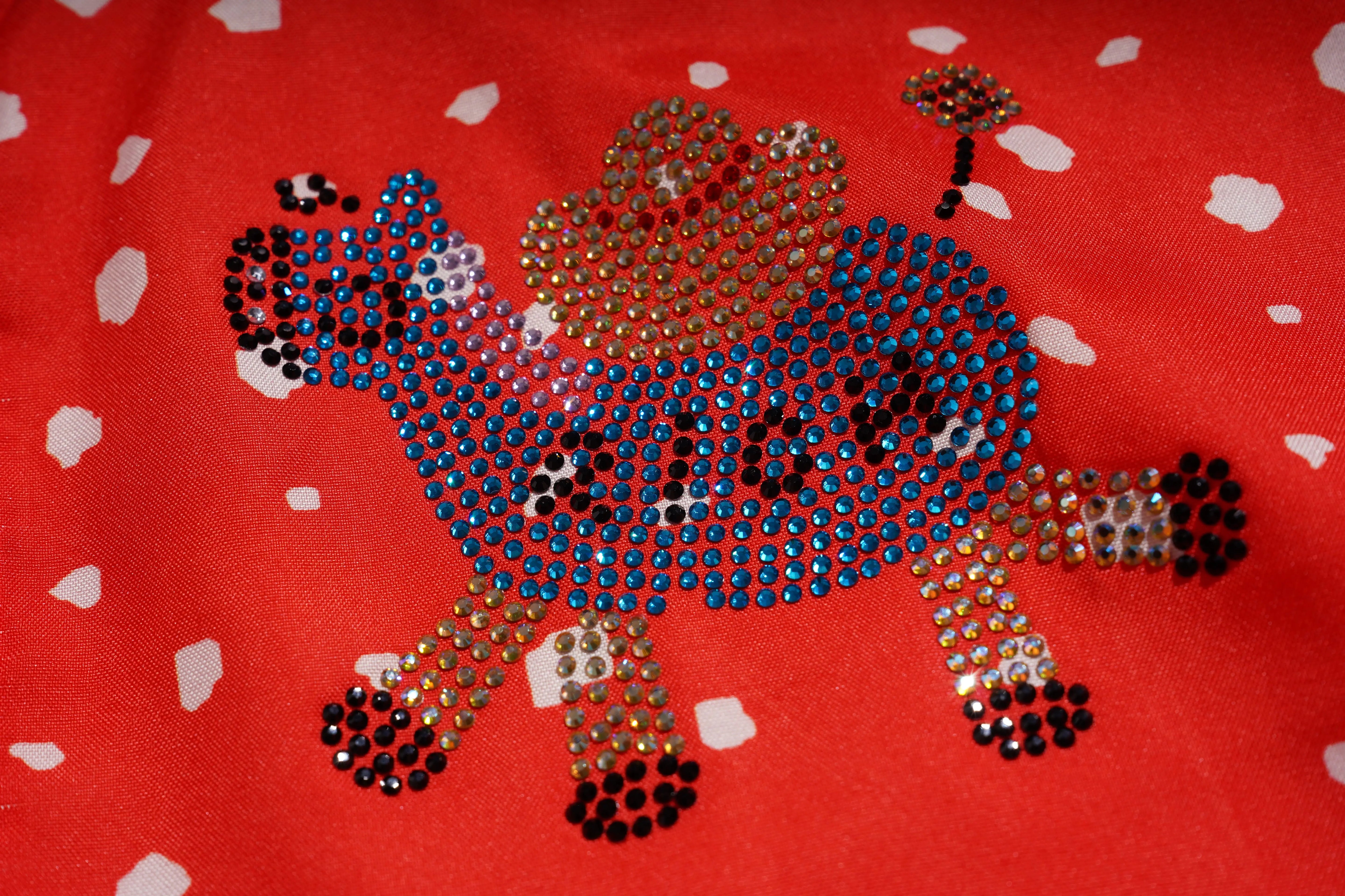 Decorative animal design with rhinestones on a red background, TCH Rhinestone Animal Polka Dot Shirt