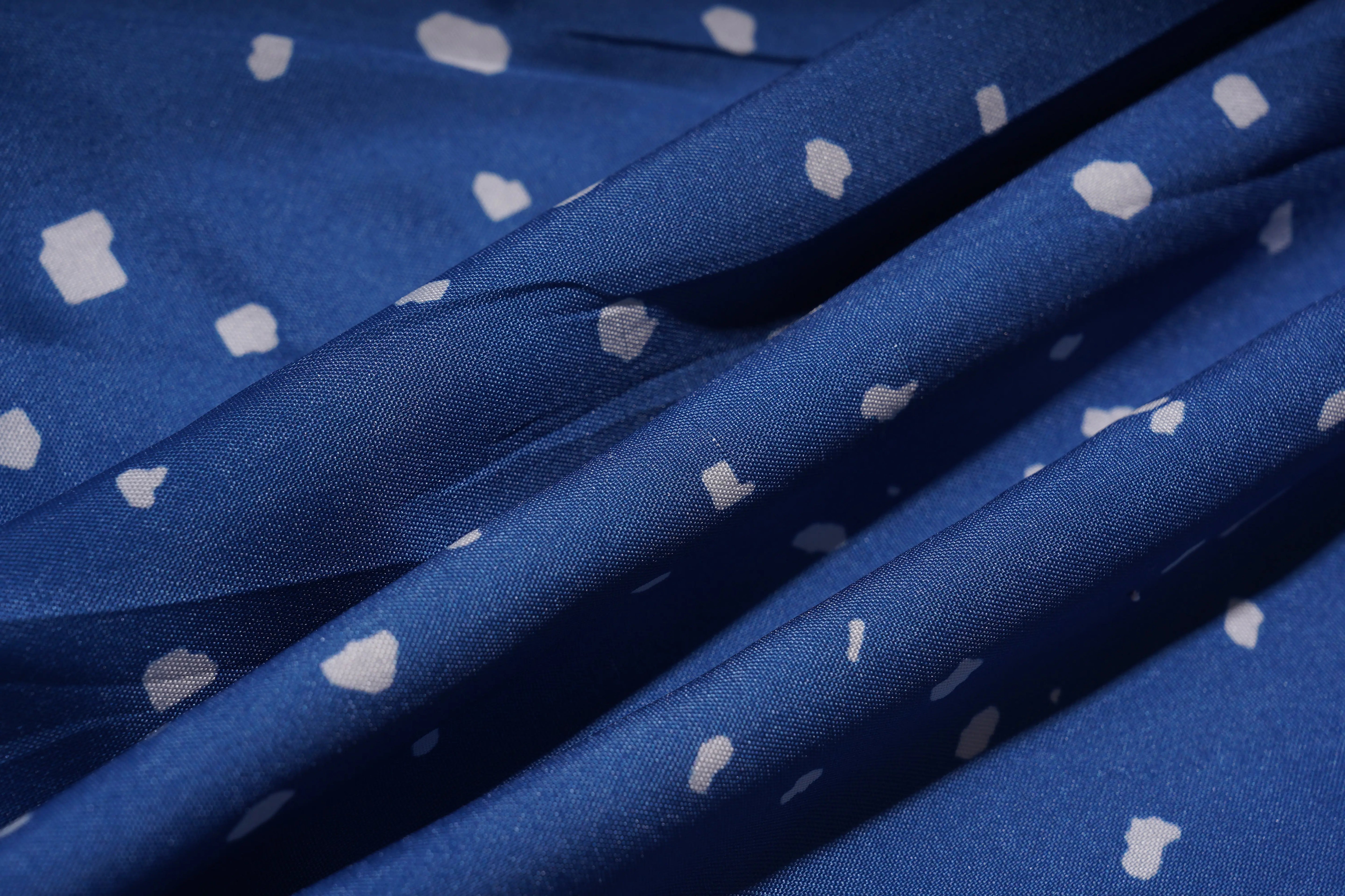 Blue fabric with white heart patterns, TCH Rhinestone Animal Polka Dot Shirt