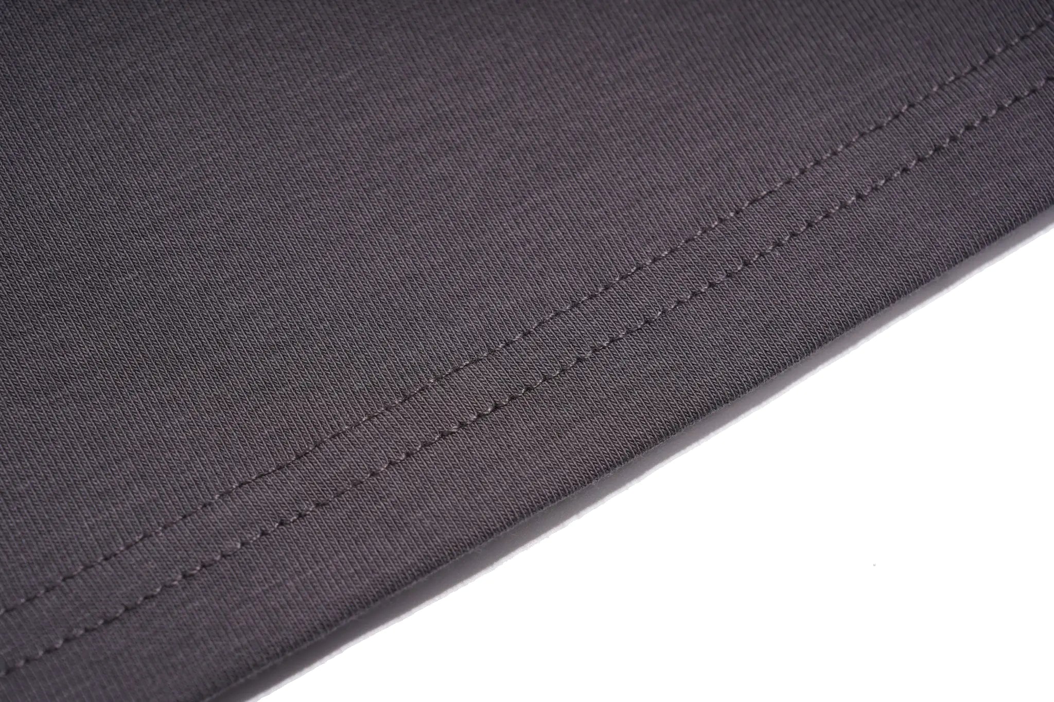 Close-up of a dark charcoal gray knit fabric with a neat diagonal hemstitch, shown against a plain white background. TCH Rhinestone Bow Crown Graphic Mini Dress