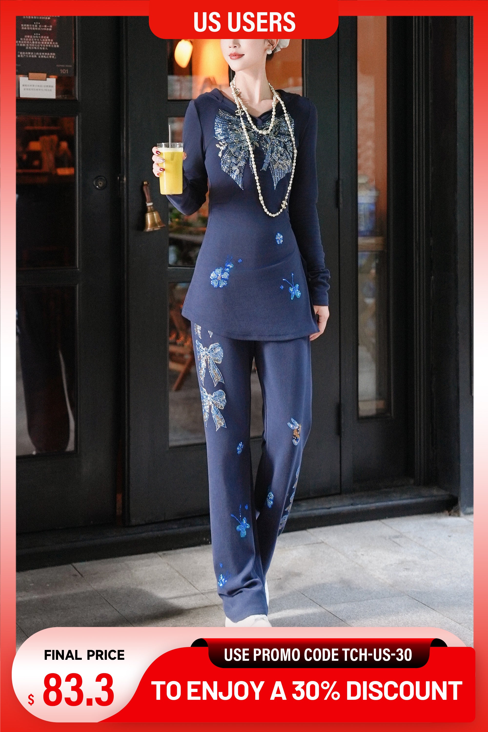 Woman in a navy blue floral outfit holding a drink, with promotional text overlay. TCH Rhinestone Bow Detail Longline Hoodie Set