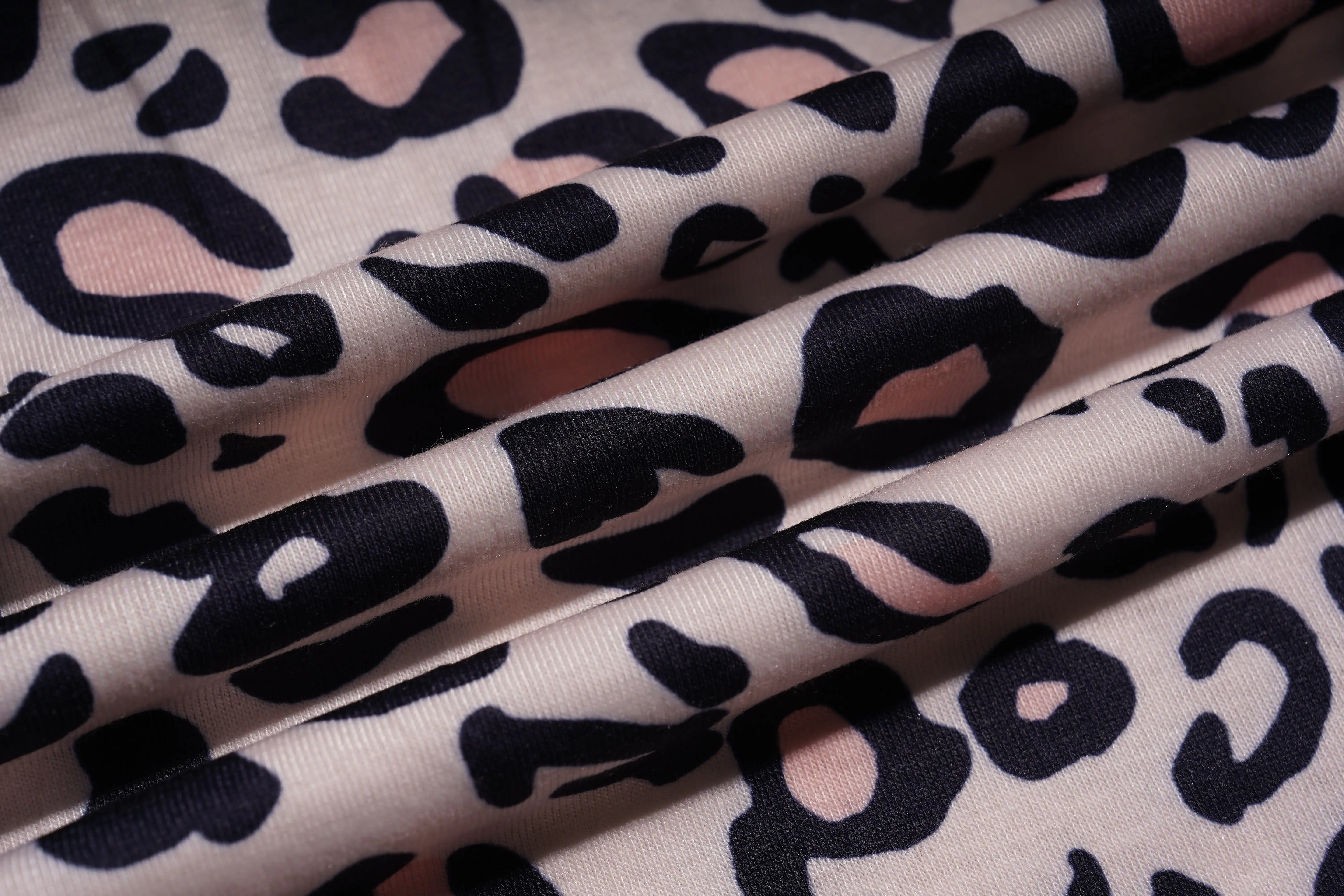 Leopard print fabric with black and pink patterns on a beige background, TCH Rhinestone Butterfly & Floral Leopard Tube Top
