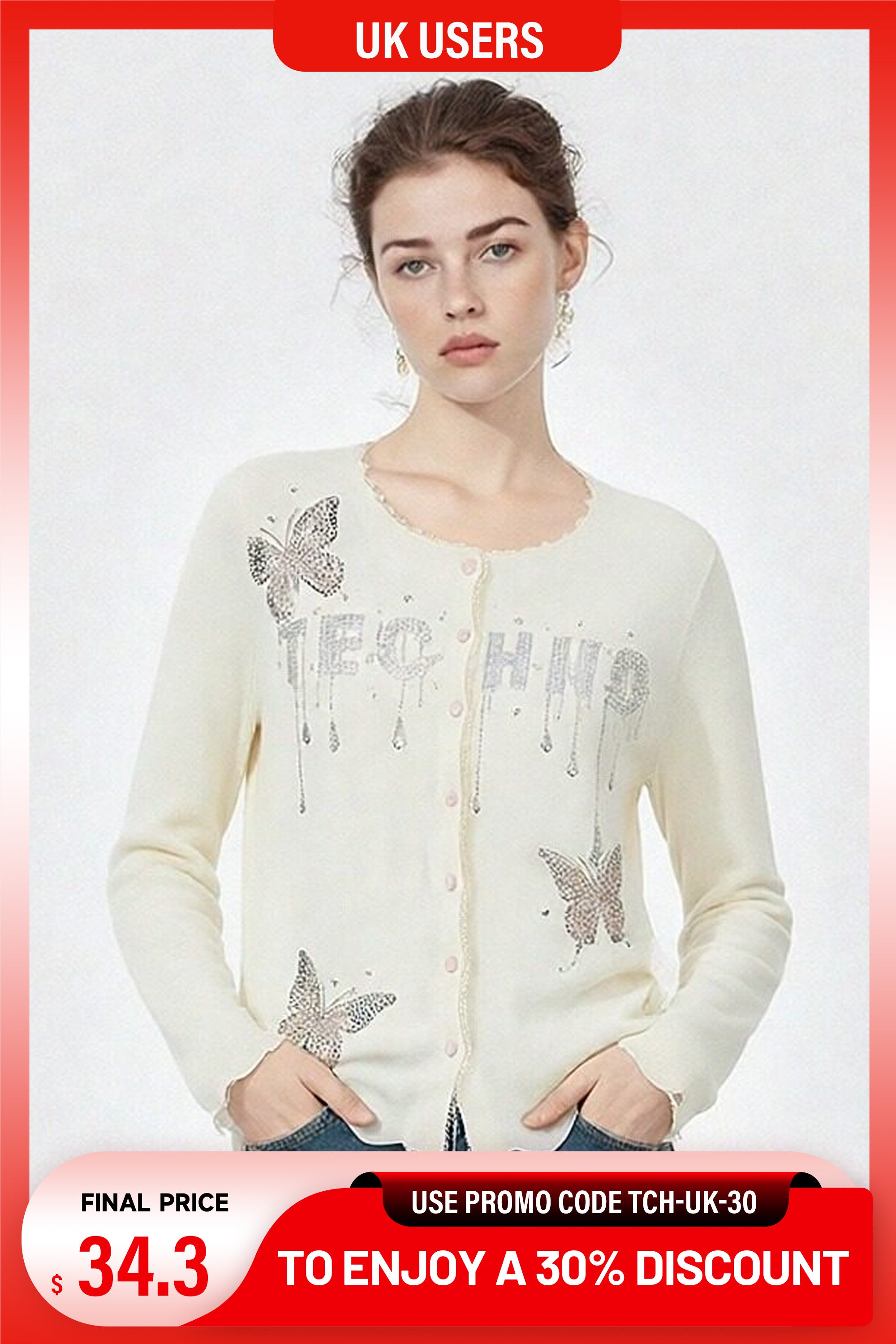 Woman wearing a white cardigan with butterfly designs on a white background, TCH Rhinestone Butterfly Logo Knit Cardigan