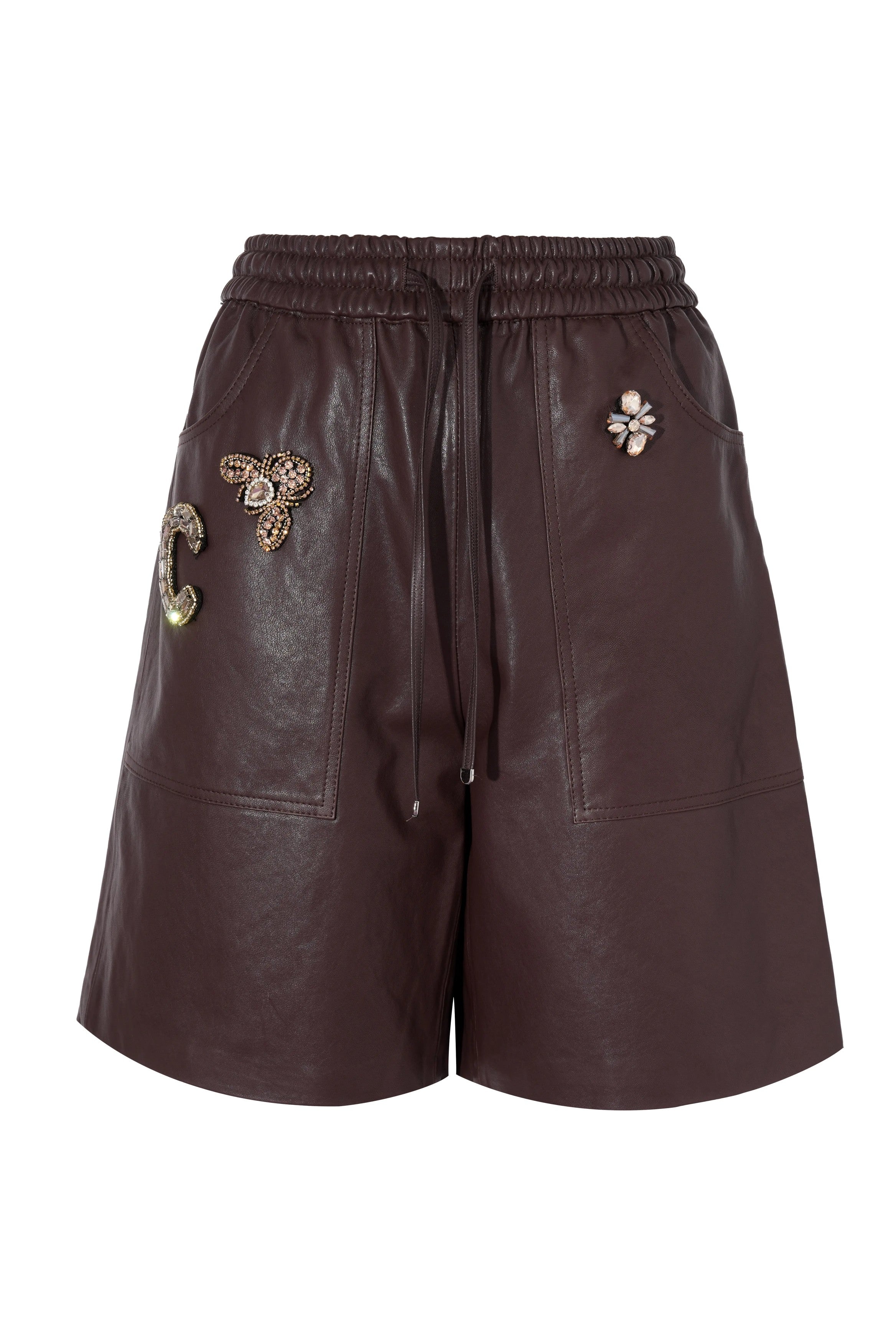 Brown leather shorts with decorative embellishments on a white background, TCH Rhinestone Charm Faux Leather Brown Shorts