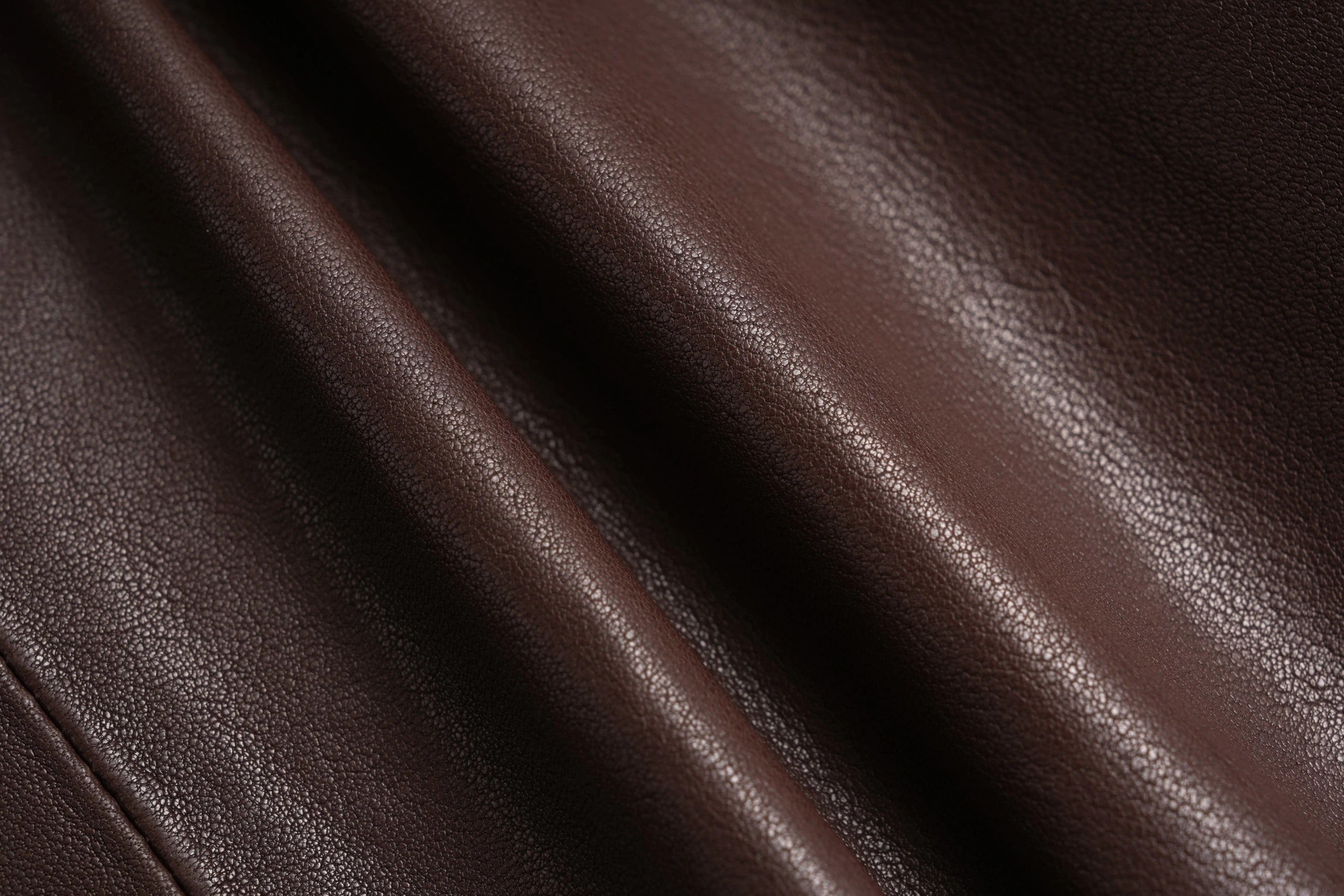 Close-up of brown leather texture, TCH Rhinestone Charm Faux Leather Brown Shorts