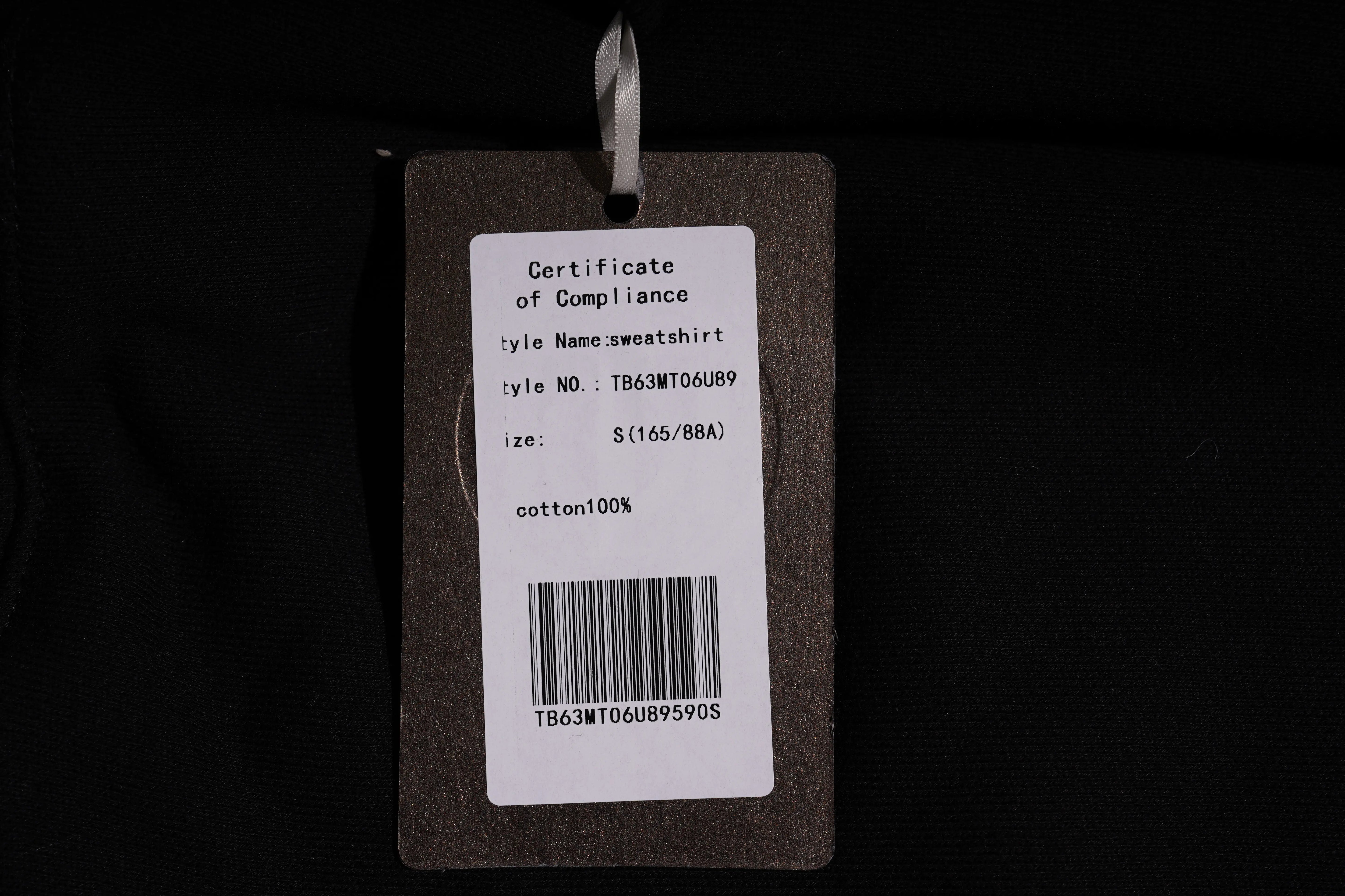 Product tag with text and barcode on a dark background, TCH Rhinestone Cute Dragon Sweatshirt-